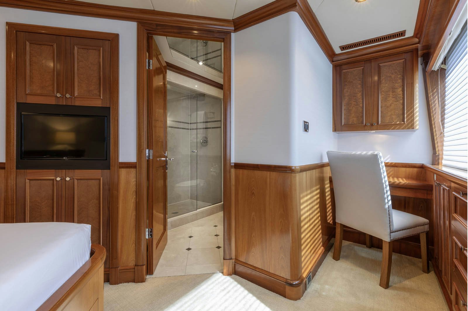 a kitchen with a sliding glass door aboard CALLIOPE Yacht for Sale