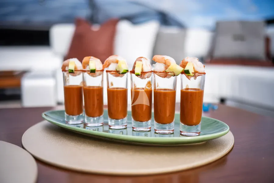 a group of glasses with different types of liquid in them aboard TASTY WAVES Yacht for Charter