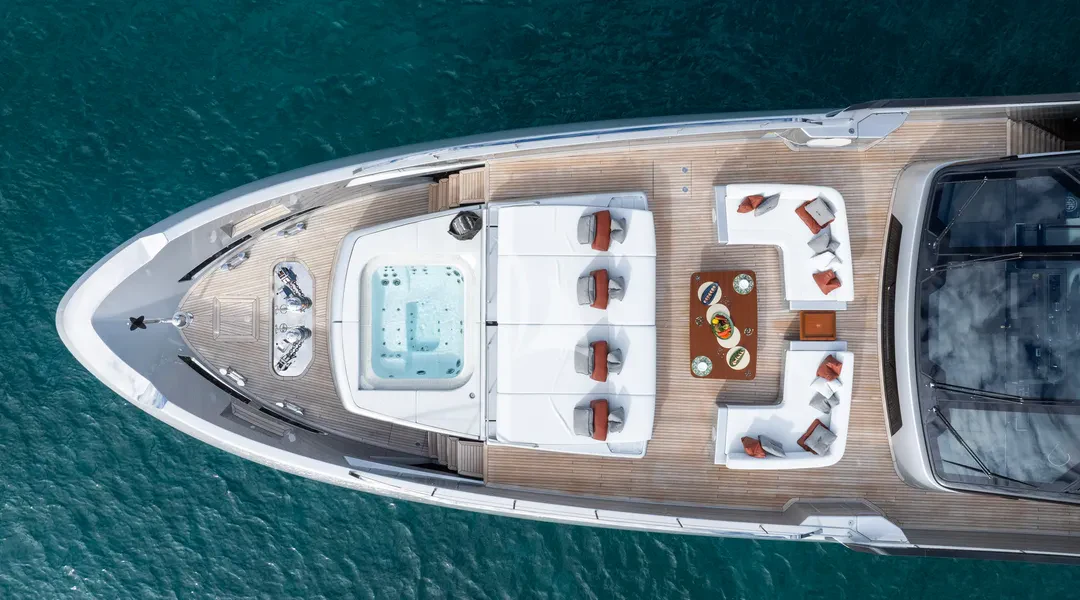 a white vehicle with many windows aboard TASTY WAVES Yacht for Charter