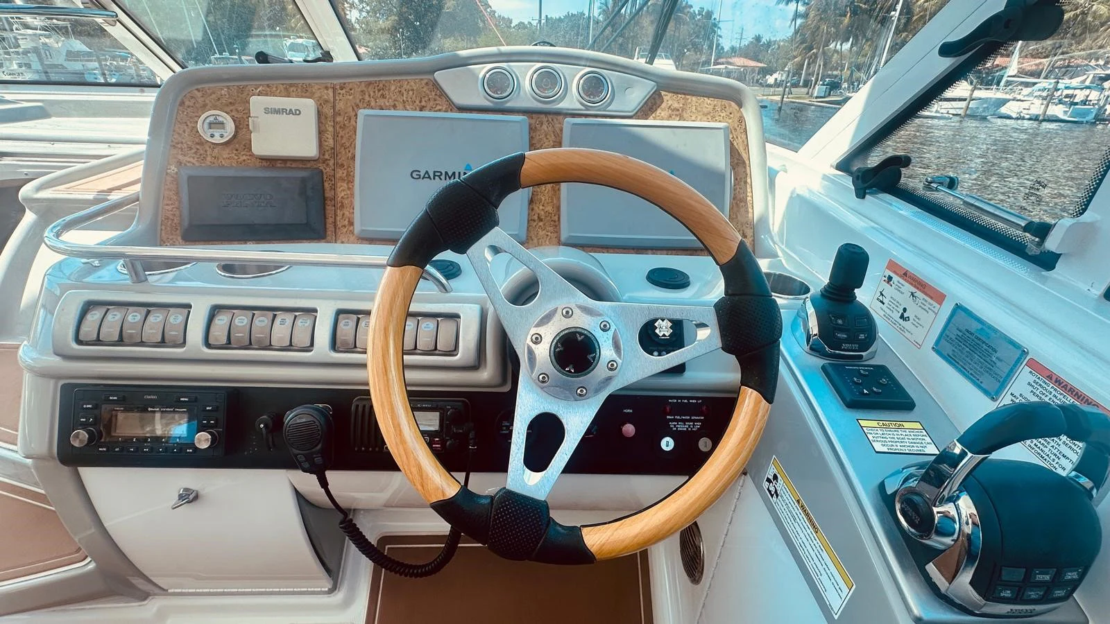 a steering wheel and dashboard of a car aboard MODERATION Yacht for Sale