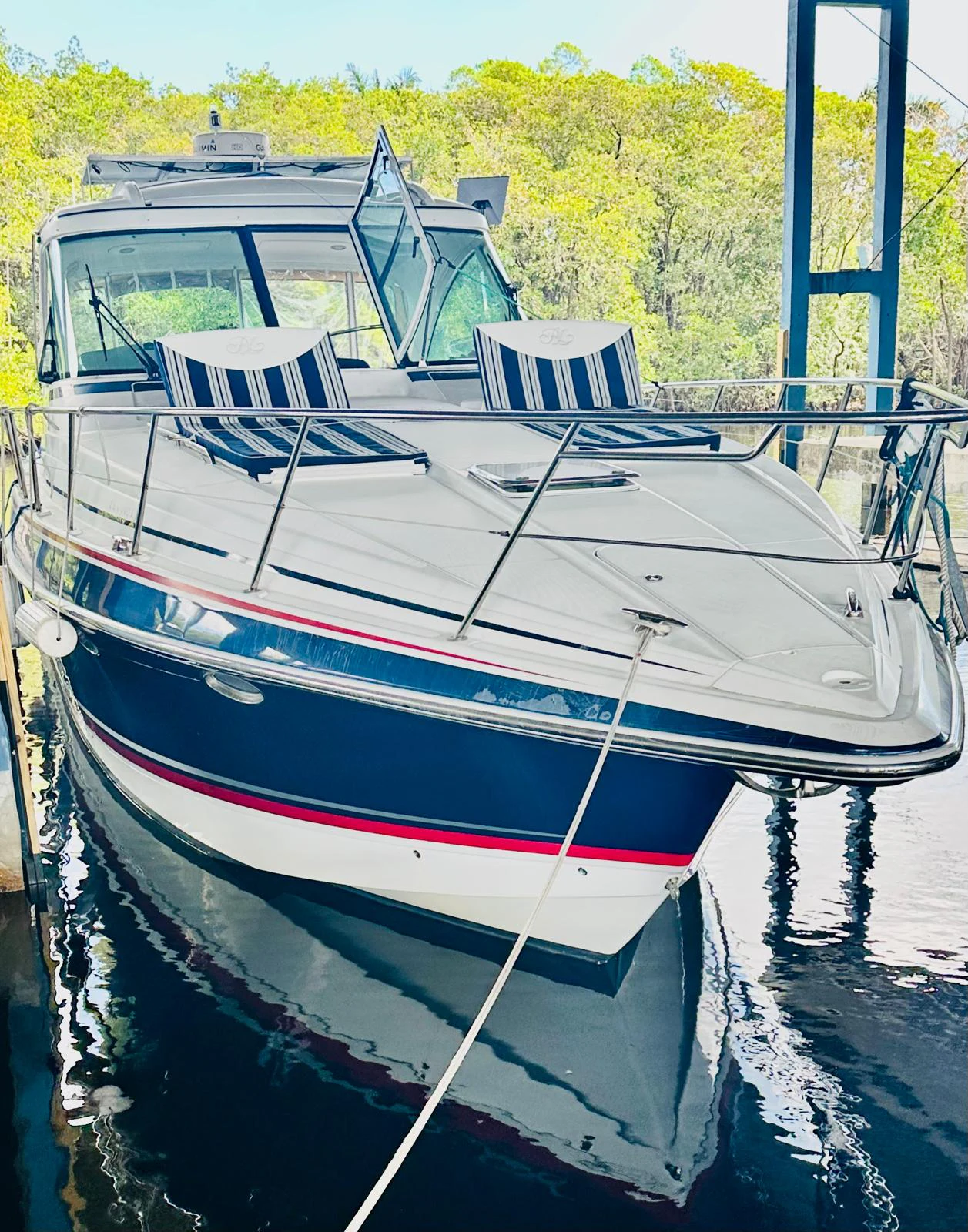 a boat is parked in the water aboard MODERATION Yacht for Sale