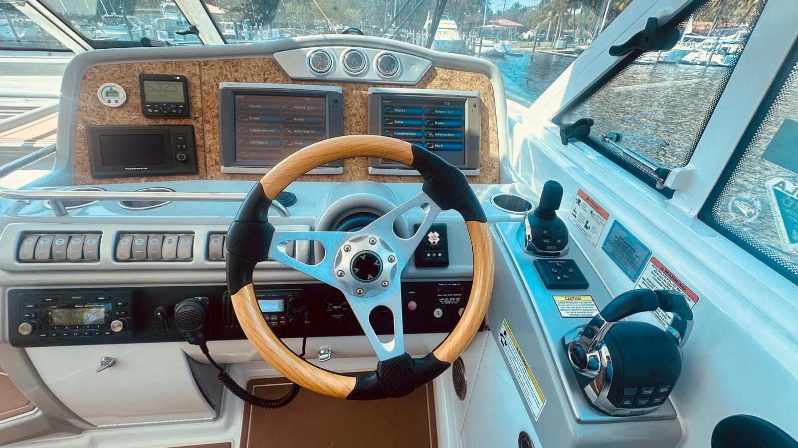 a steering wheel and dashboard of a car aboard MODERATION Yacht for Sale