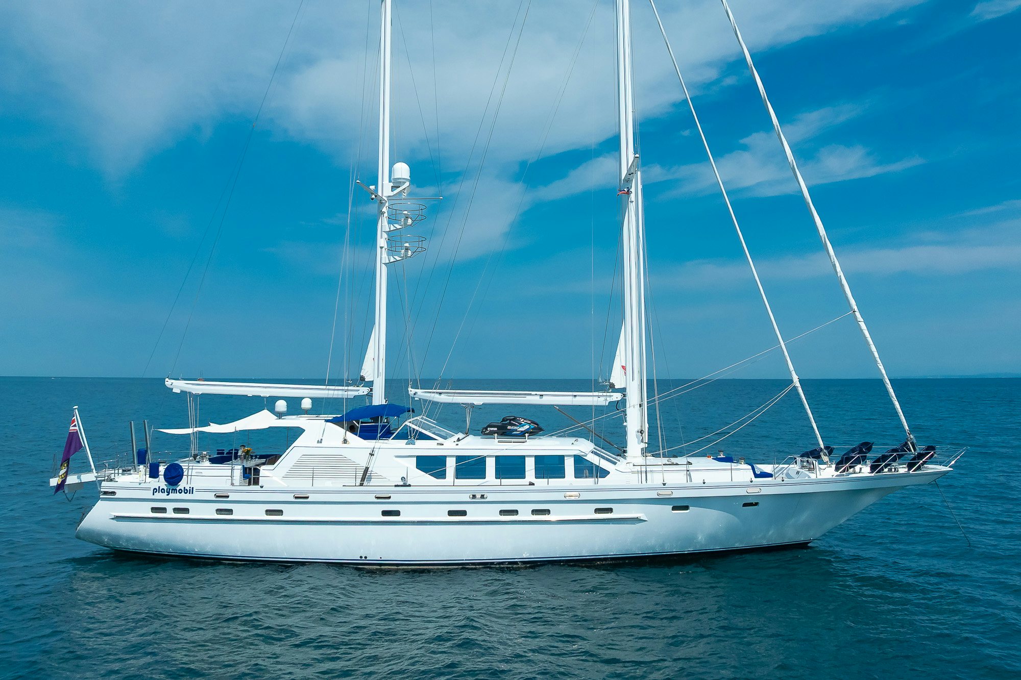 a white yacht in the water aboard PLAYMOBIL Yacht for Sale