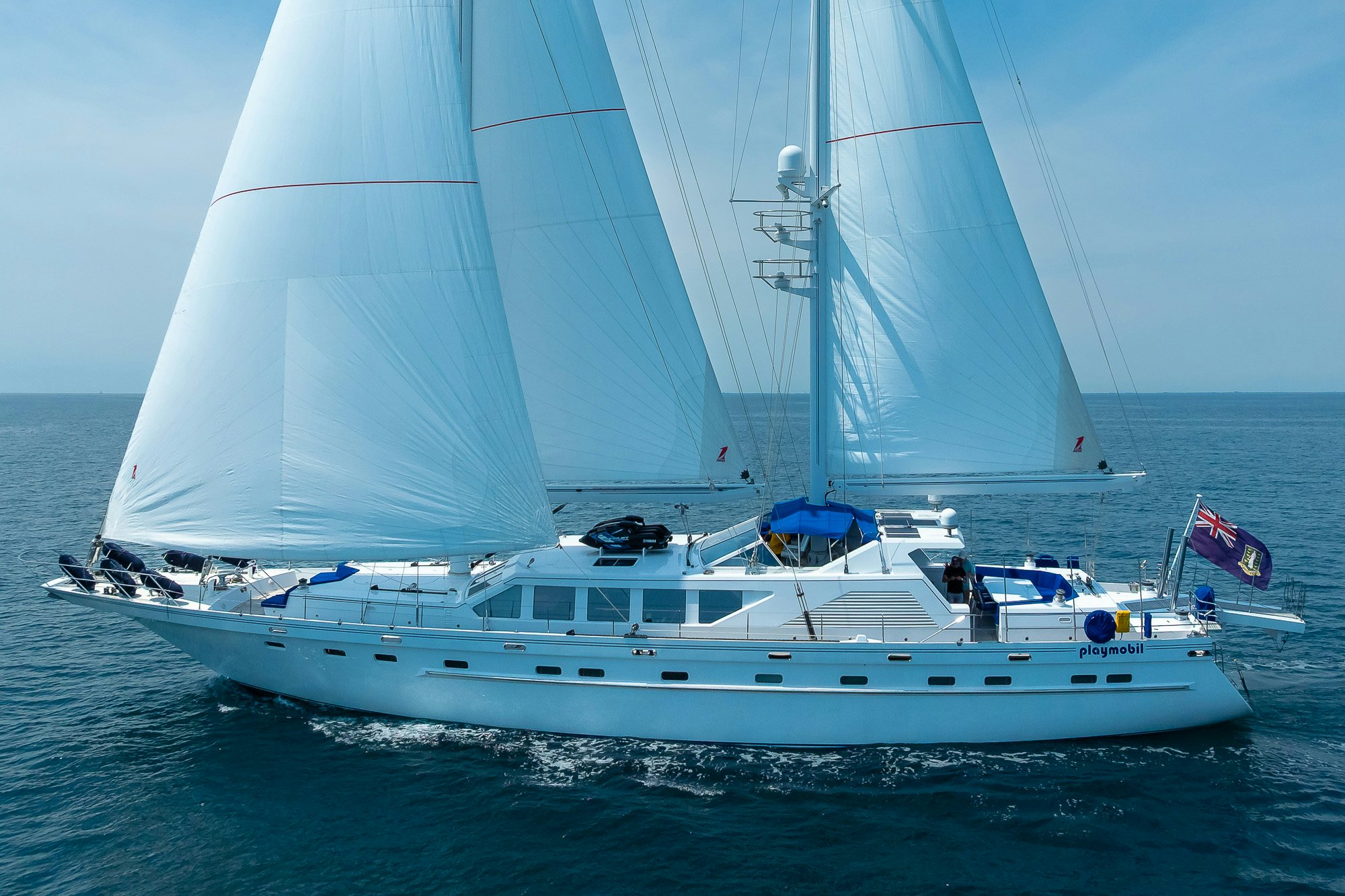 a white boat on the water aboard PLAYMOBIL Yacht for Sale