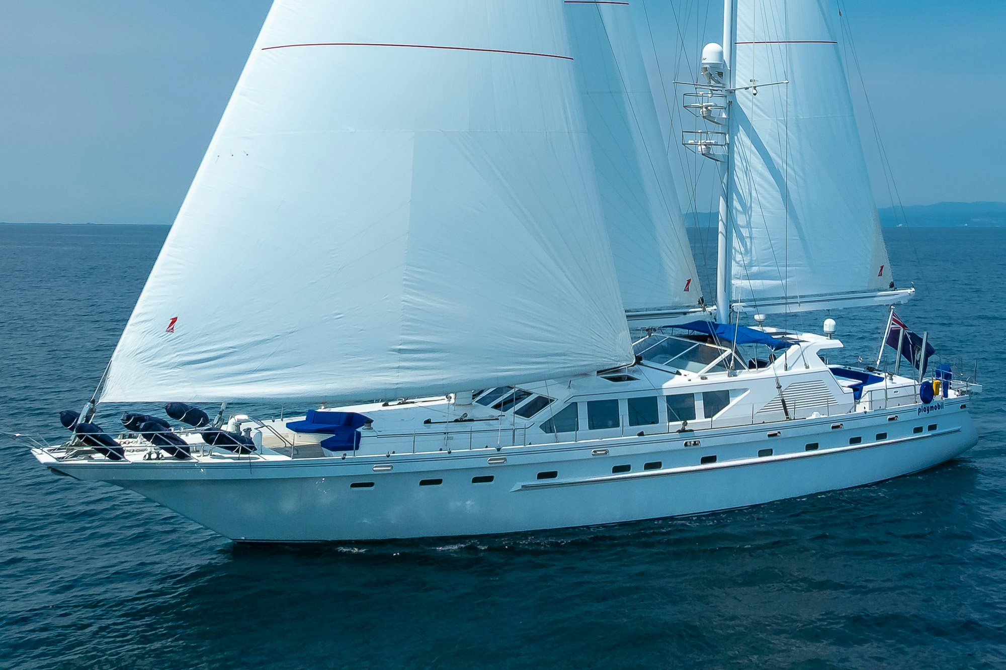 a large white boat in the water aboard PLAYMOBIL Yacht for Sale