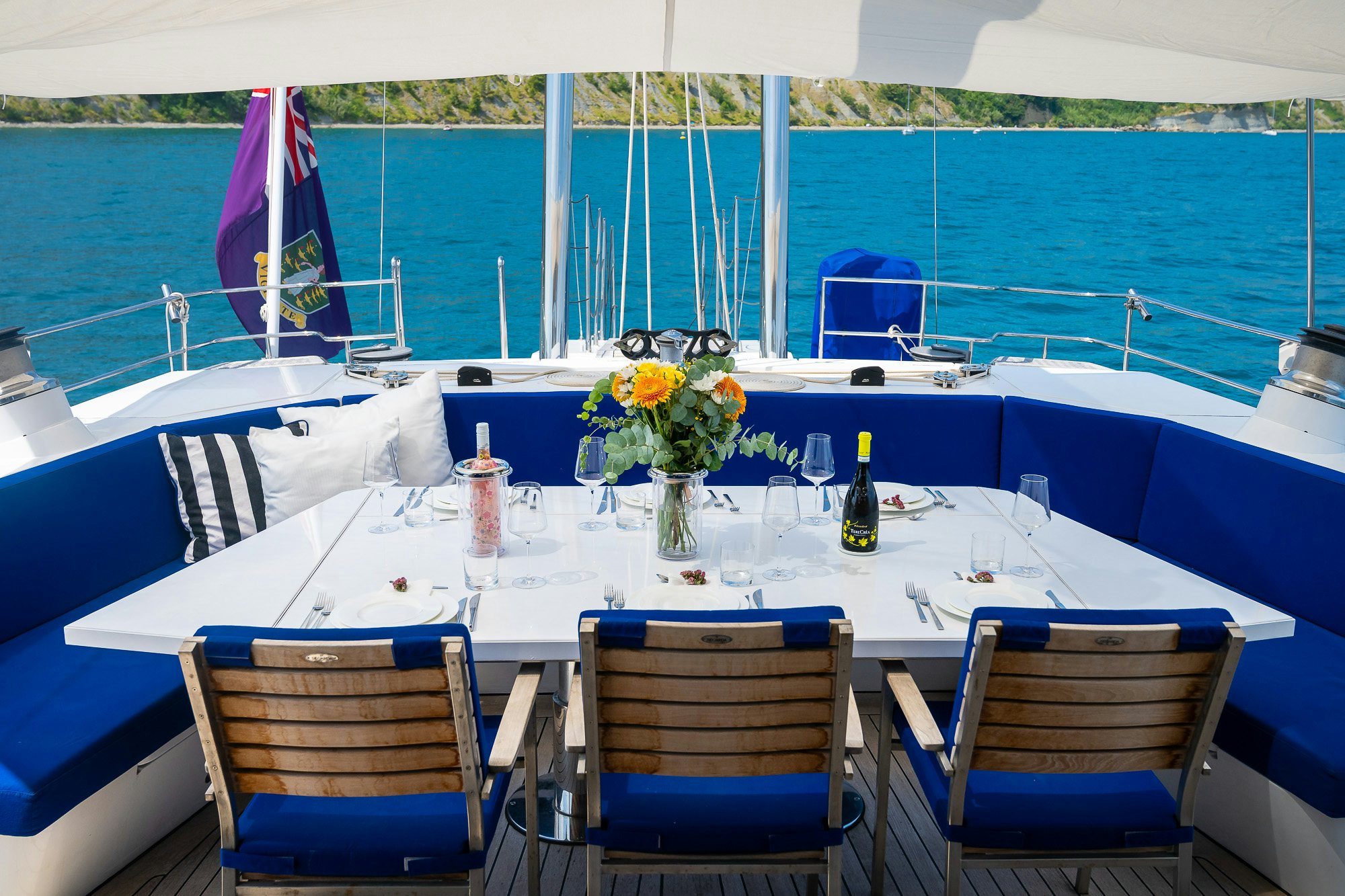 a table set for a dinner on a boat aboard PLAYMOBIL Yacht for Sale