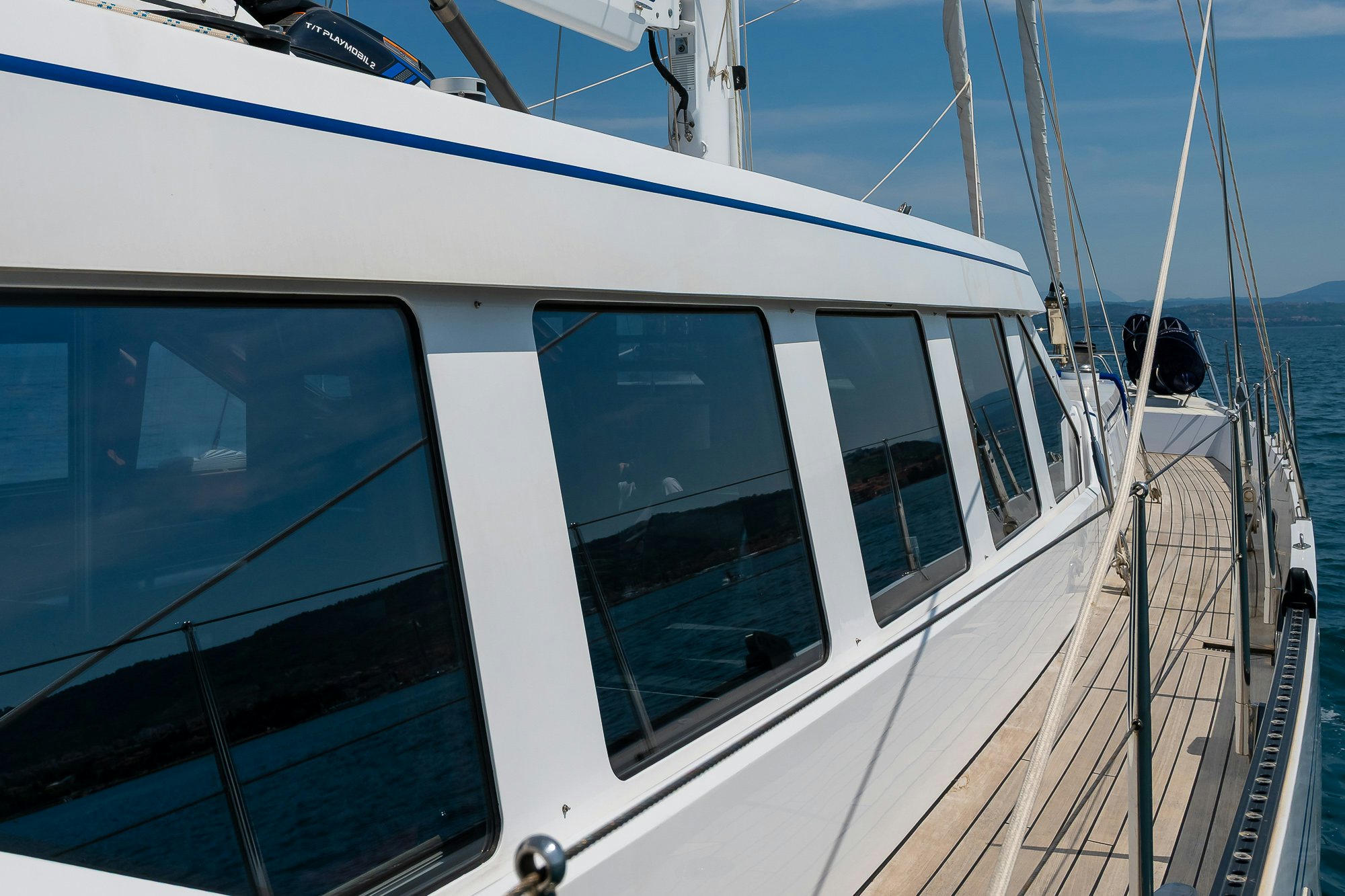 a boat with a large sail aboard PLAYMOBIL Yacht for Sale