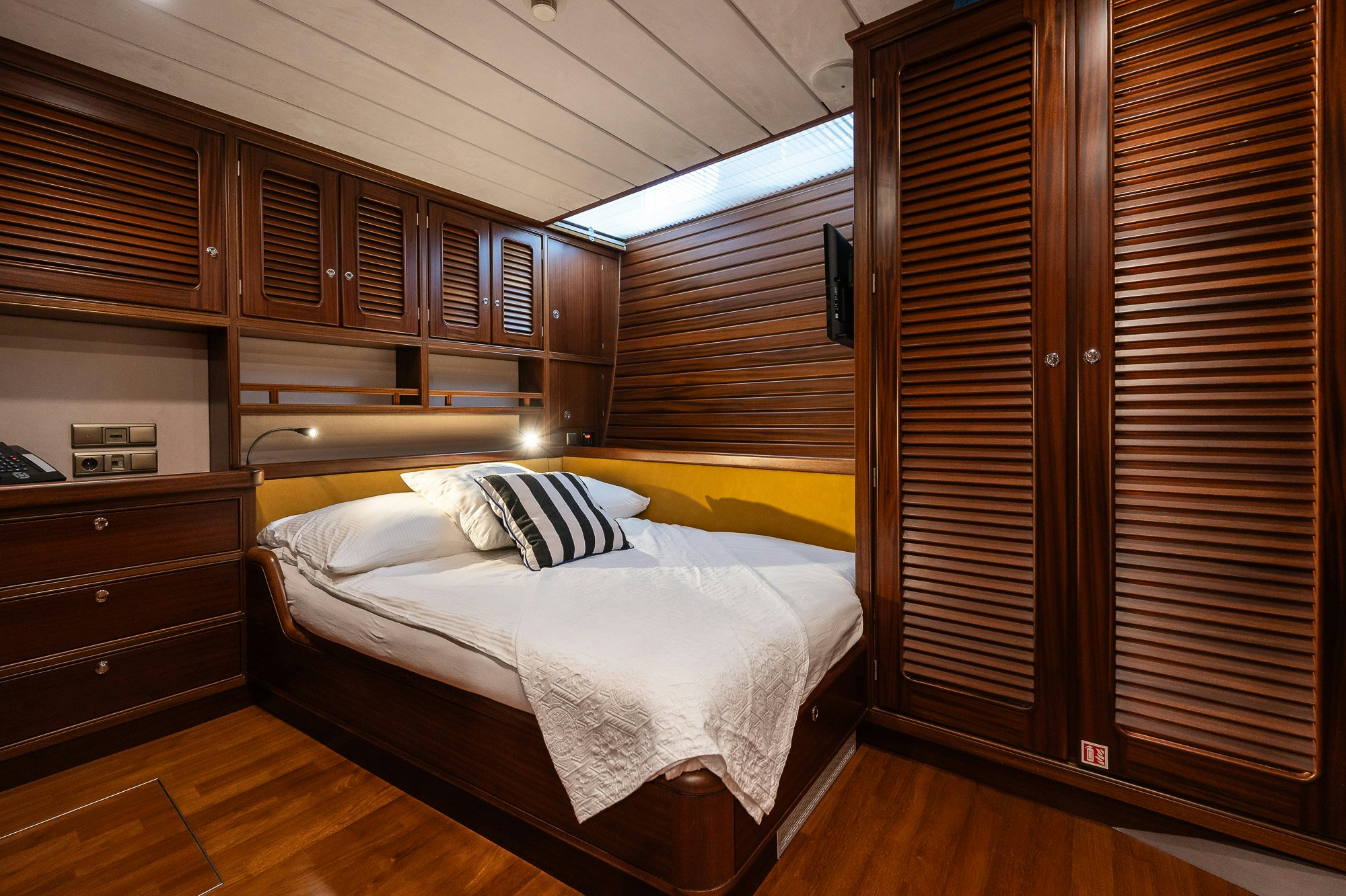 a bed in a room aboard PLAYMOBIL Yacht for Sale