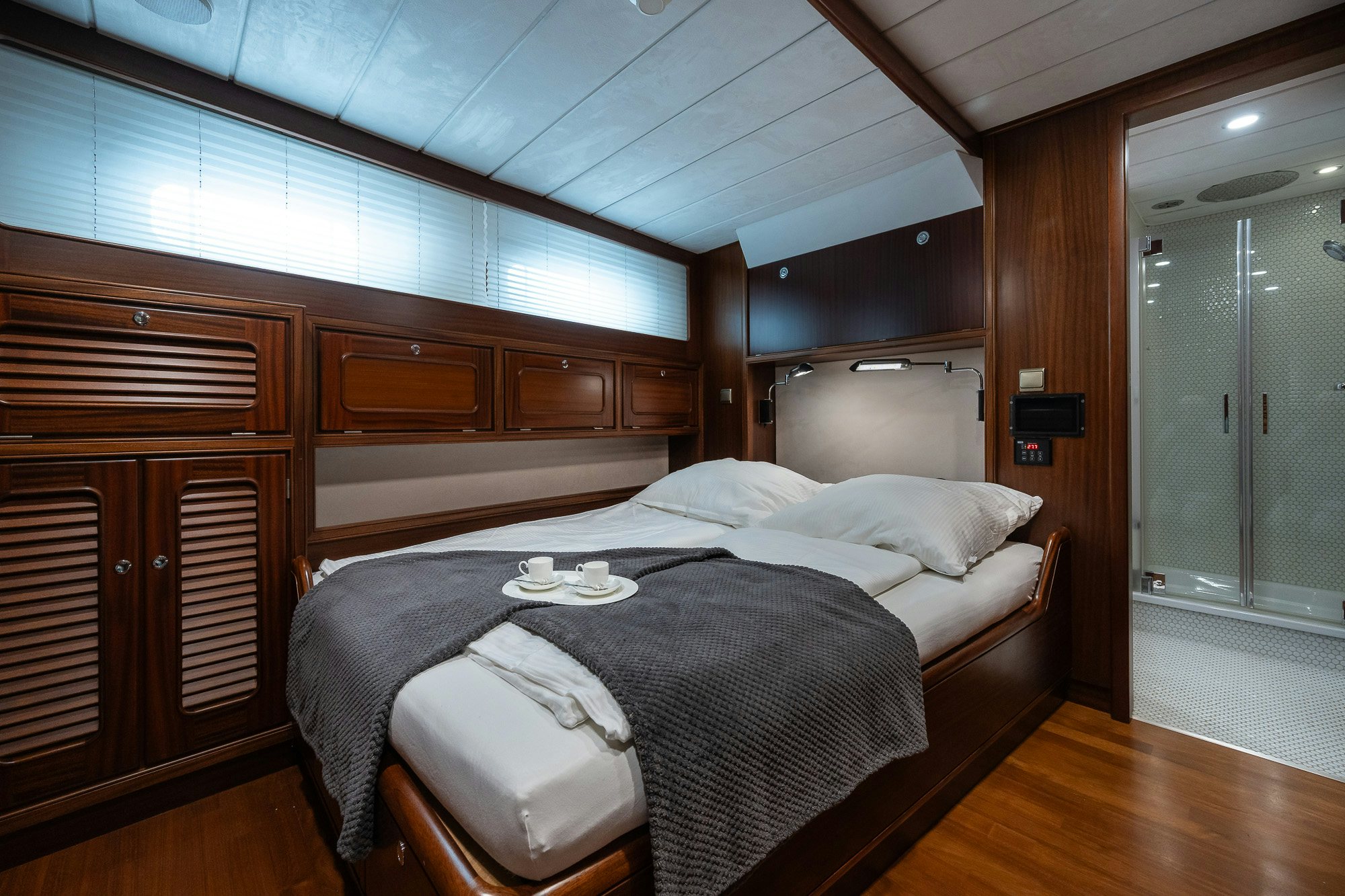 a bed in a room aboard PLAYMOBIL Yacht for Sale