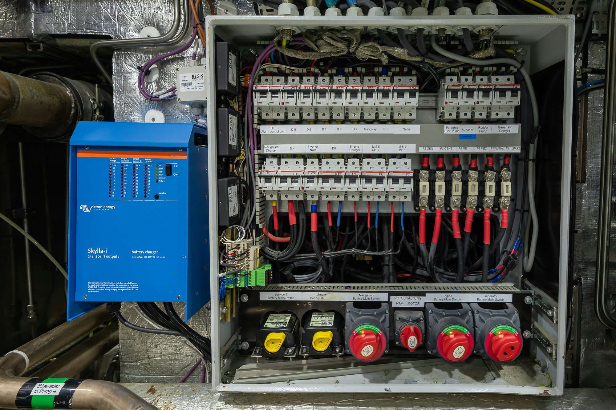 a small refrigerator with many bottles inside aboard PLAYMOBIL Yacht for Sale
