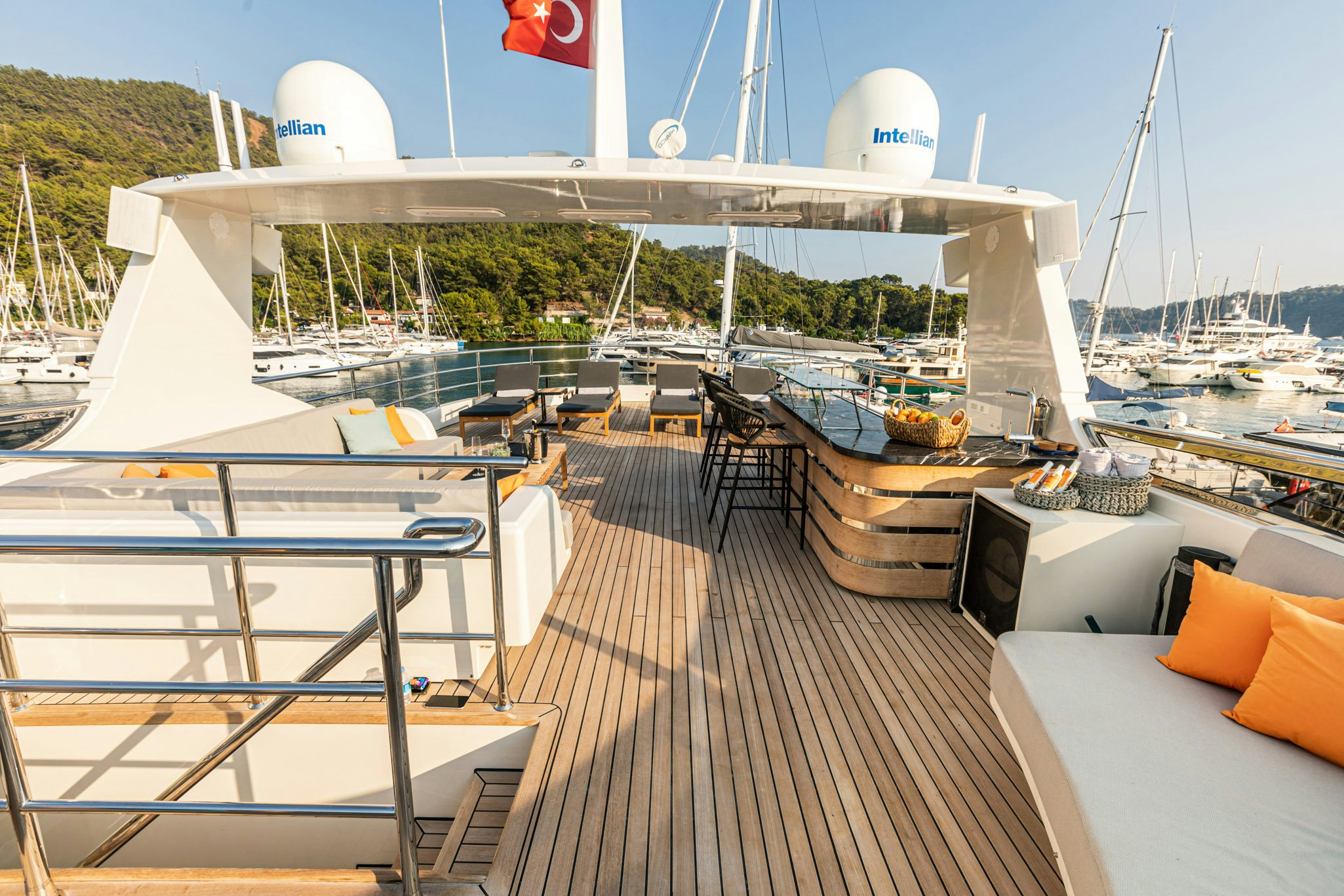 a deck with a large white building and a large white building with a dome on top aboard ZEEMAR Yacht for Charter