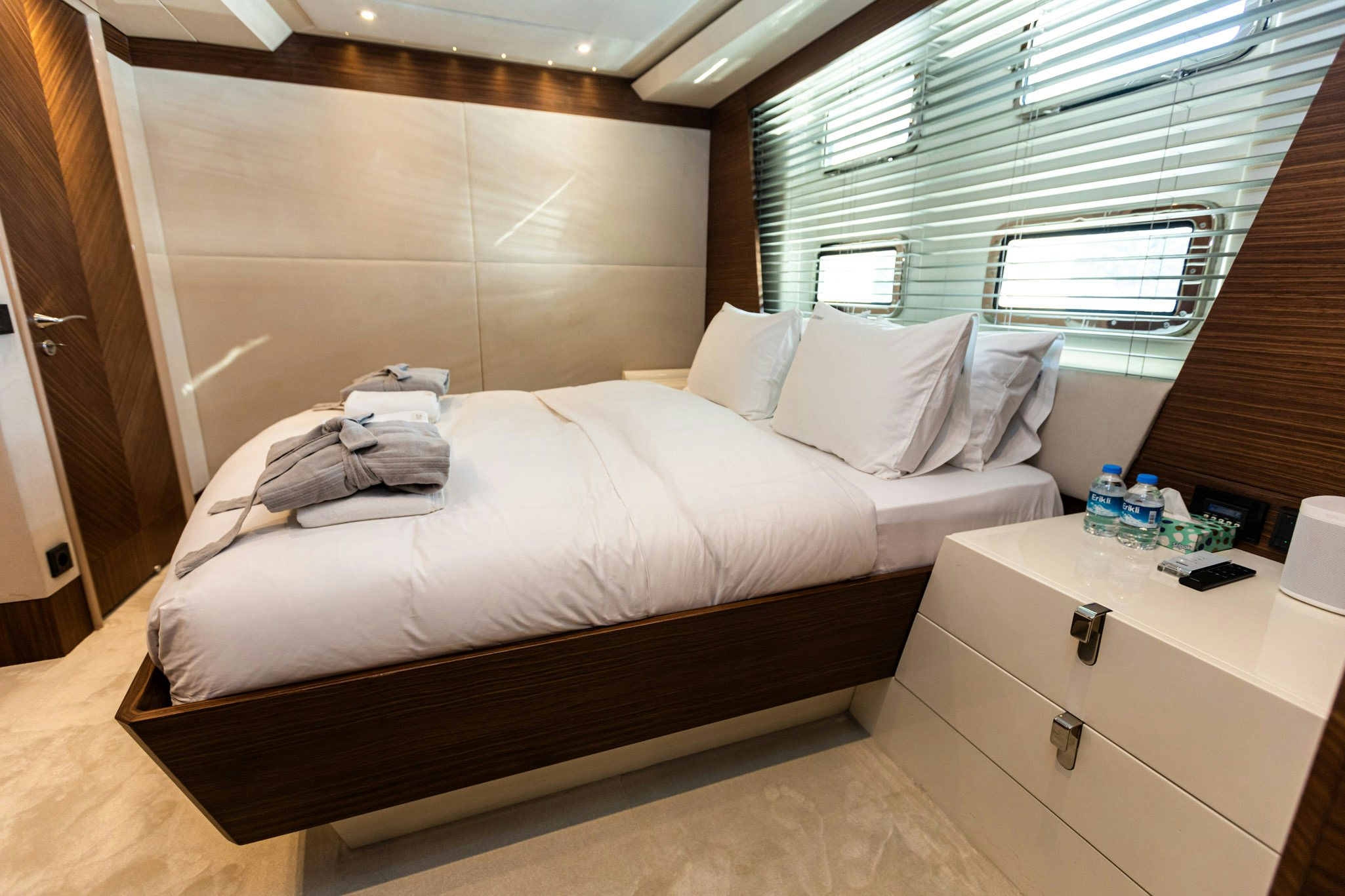 a bed in a room aboard ZEEMAR Yacht for Charter