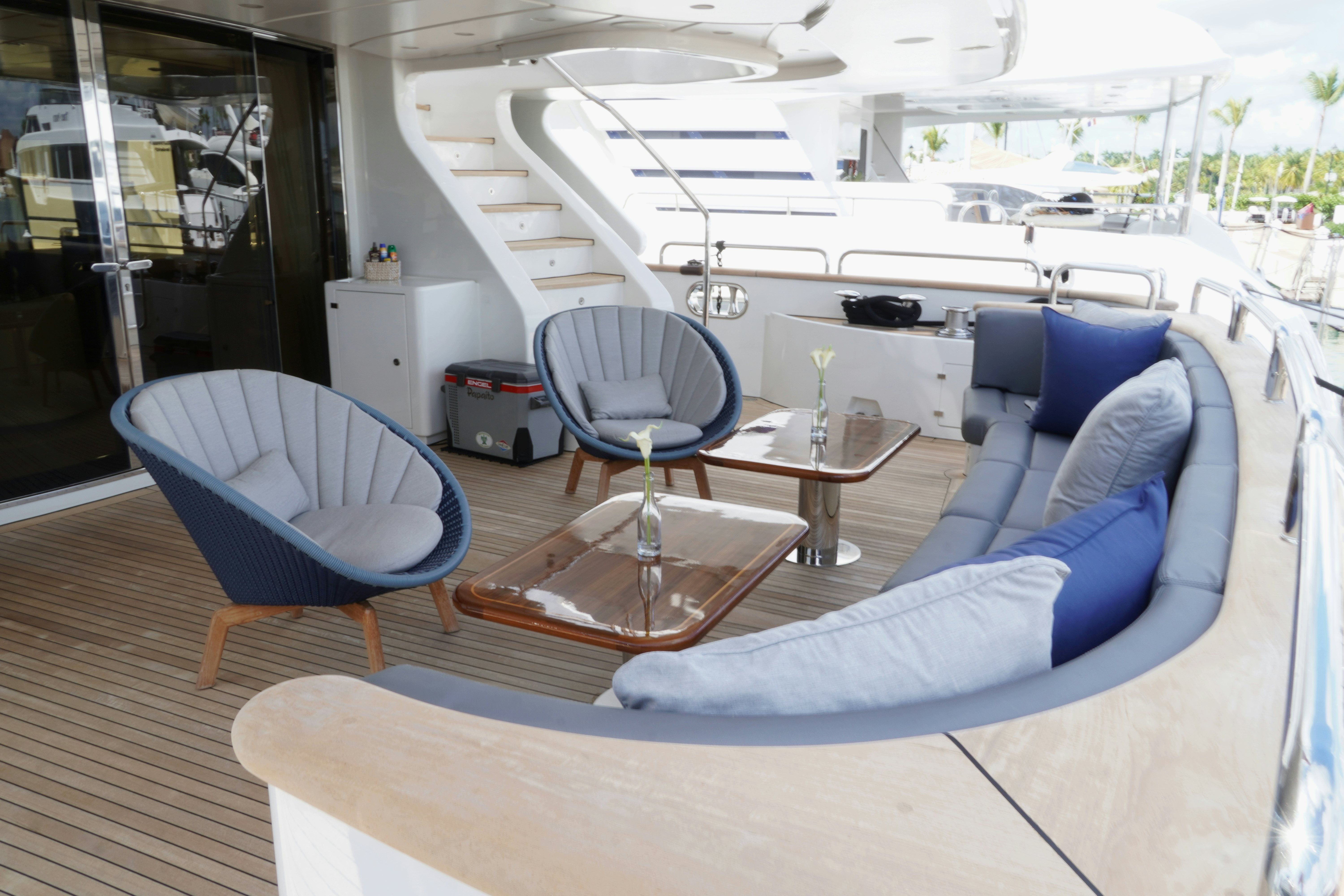 a room with a couch and a table aboard PAPAITO Yacht for Charter
