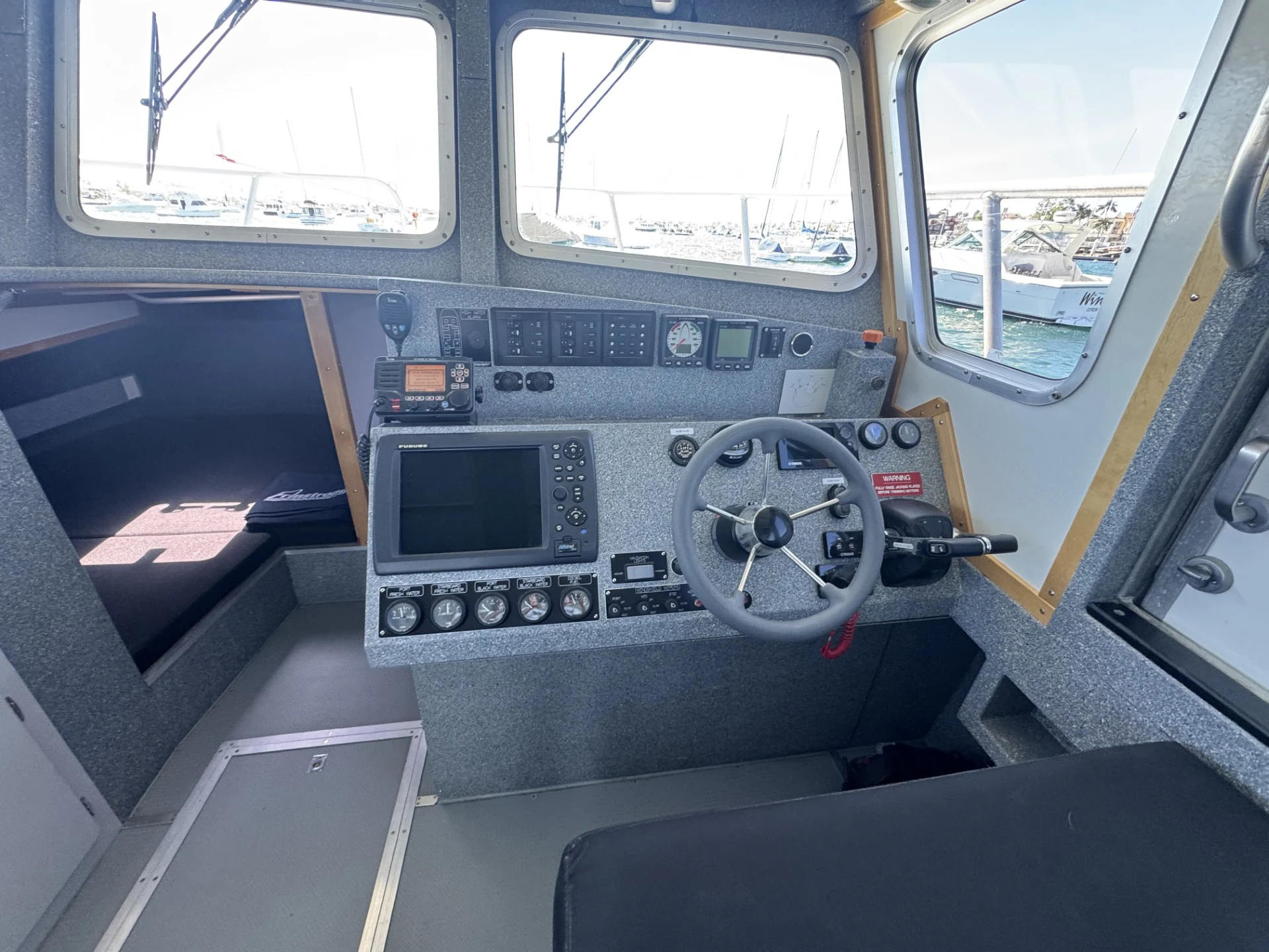 the inside of a car aboard ALKOA Yacht for Sale