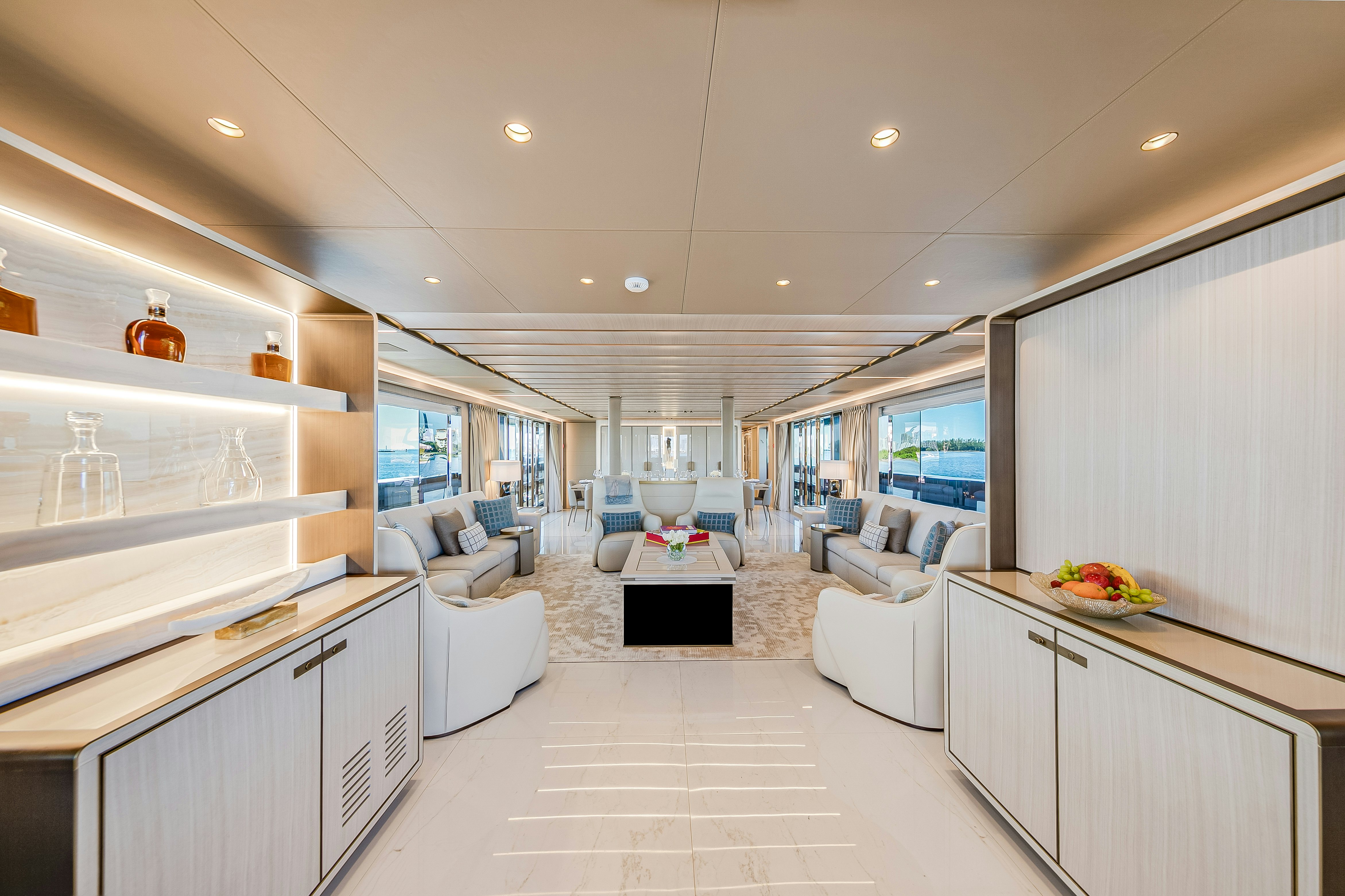a large white kitchen with white cabinets aboard EIV Yacht for Sale