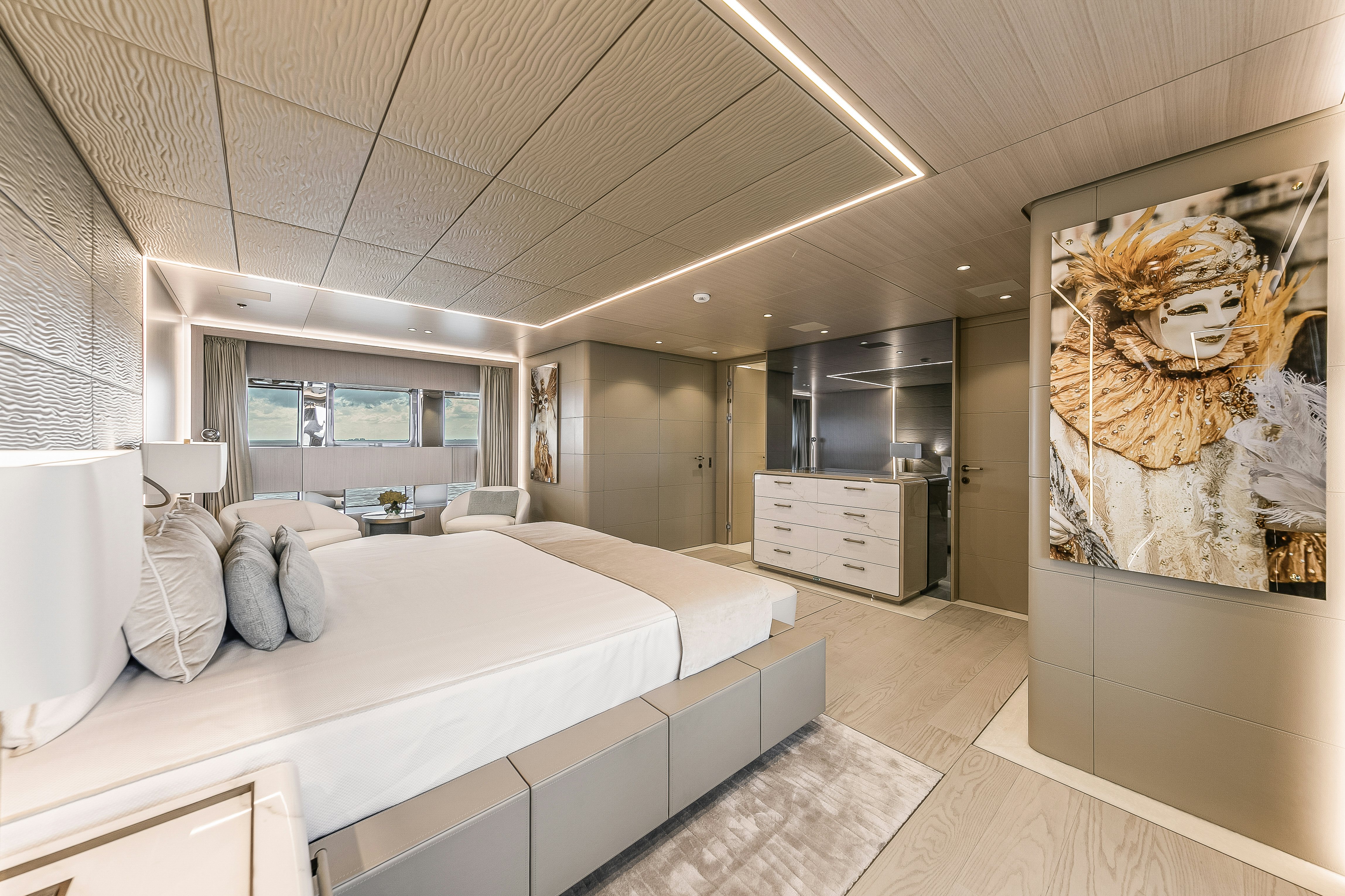 a bedroom with a large bed aboard EIV Yacht for Sale