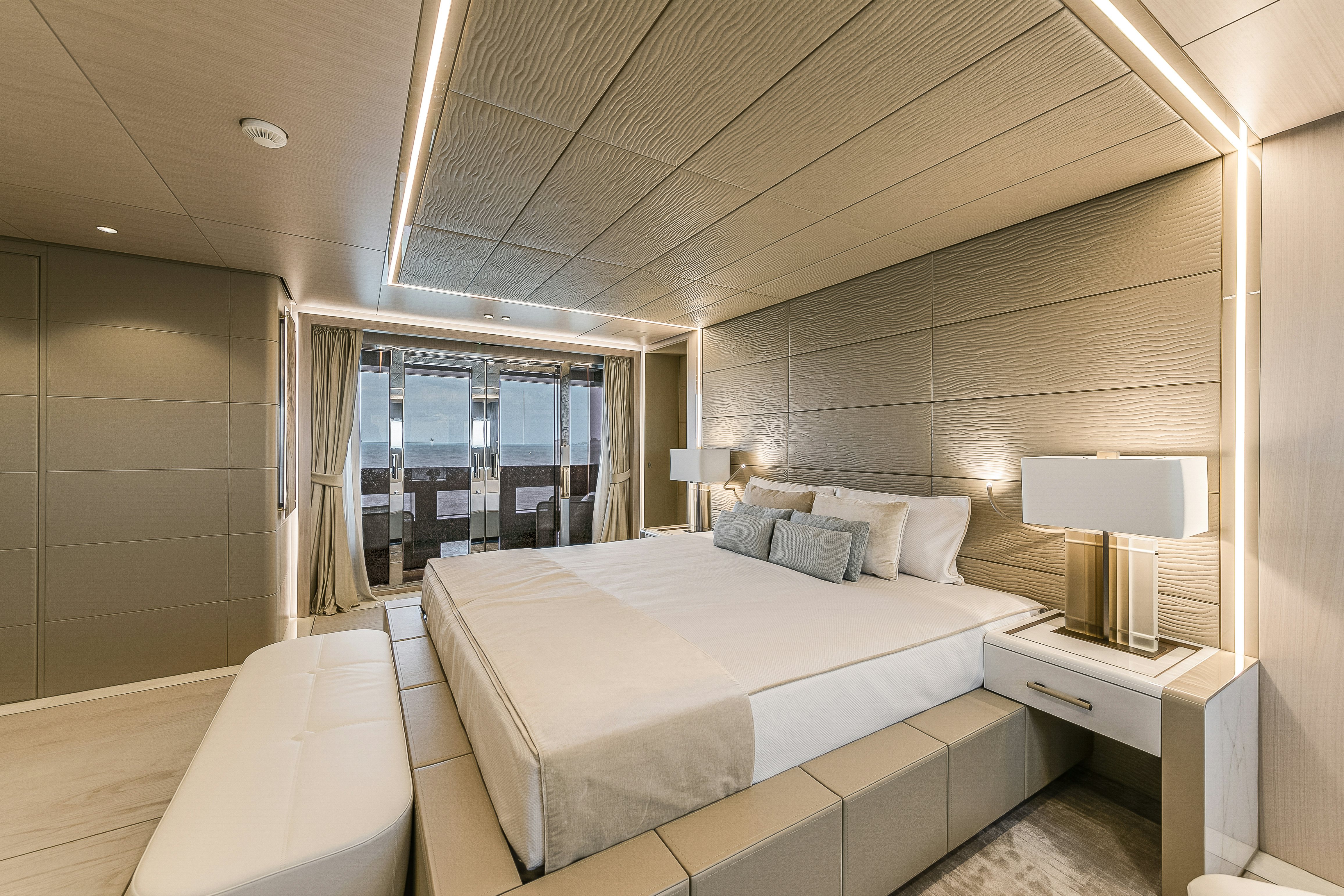 a bed in a room aboard EIV Yacht for Sale