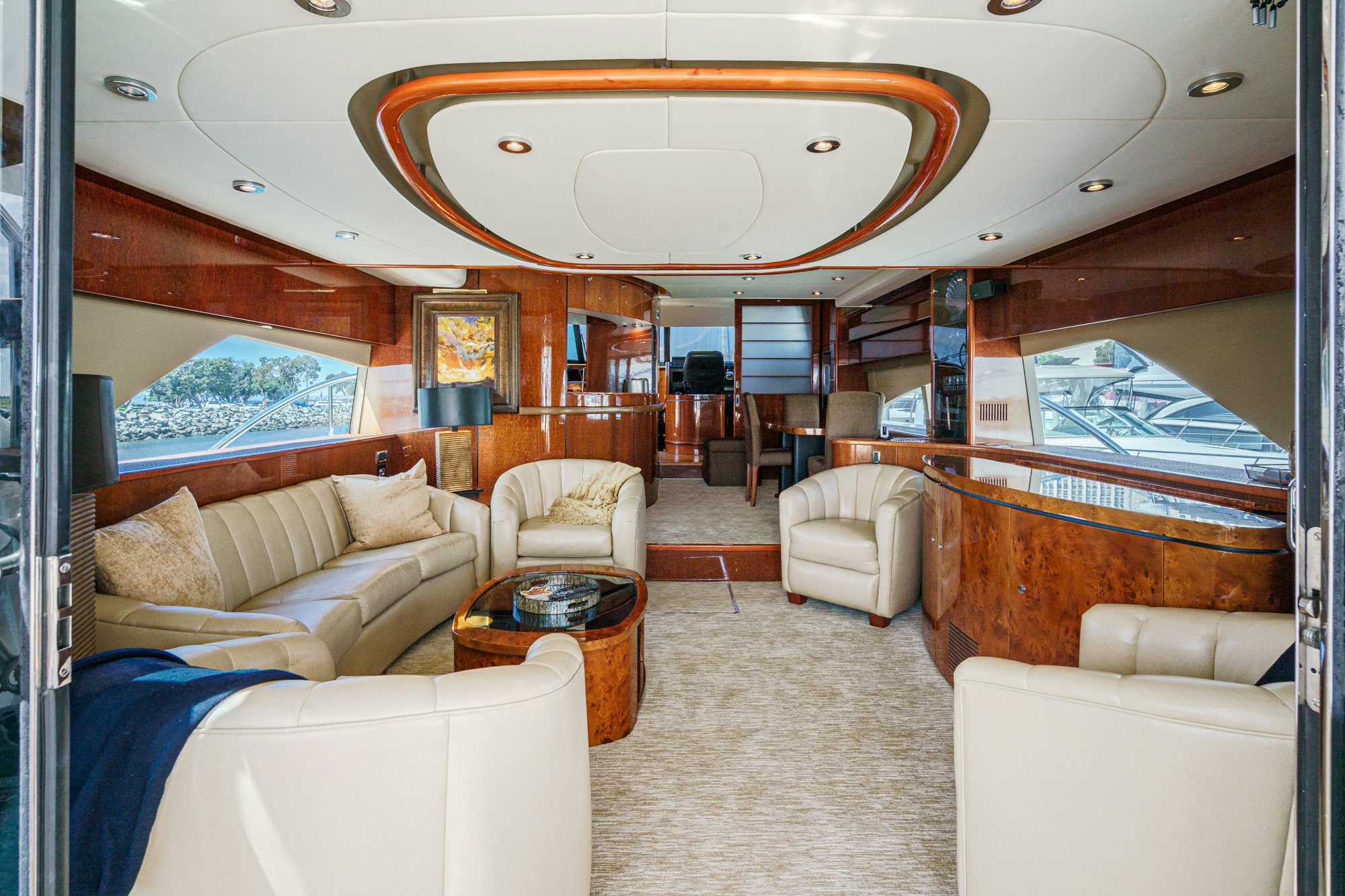 a living room with a large fish tank aboard COMPASS ROSE Yacht for Sale