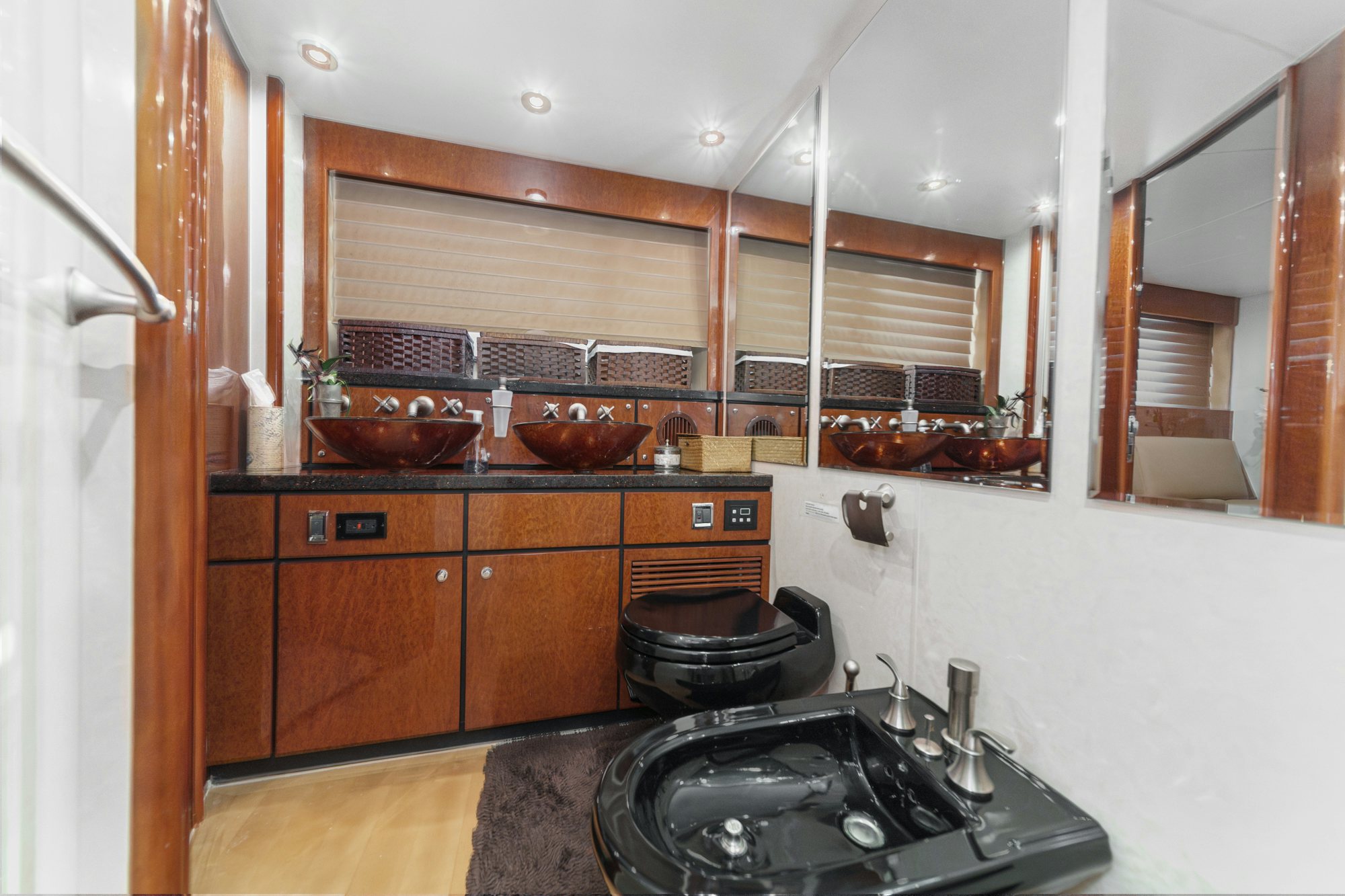 a kitchen with a stove and a sink aboard COMPASS ROSE Yacht for Sale
