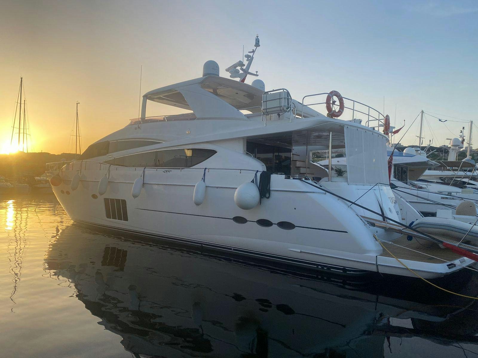a white yacht in the water aboard VIXEN Yacht for Sale
