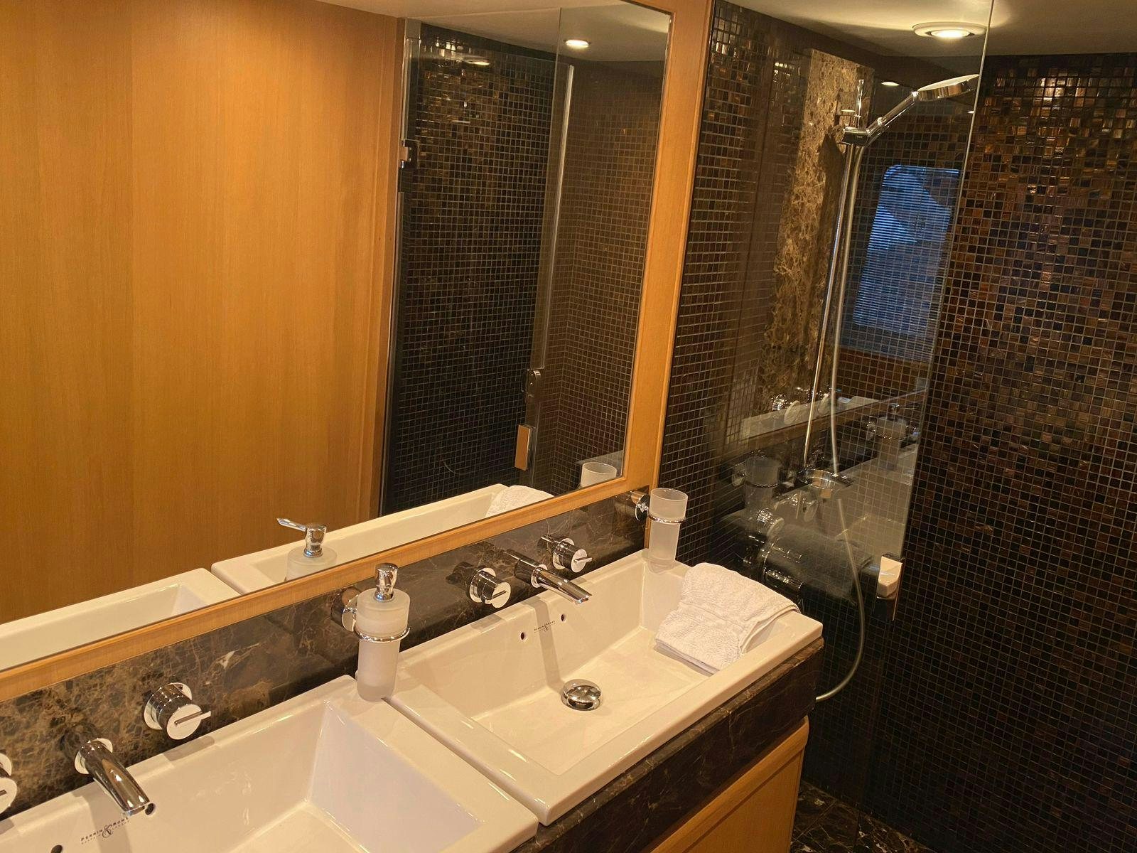 a bathroom with two sinks aboard VIXEN Yacht for Sale