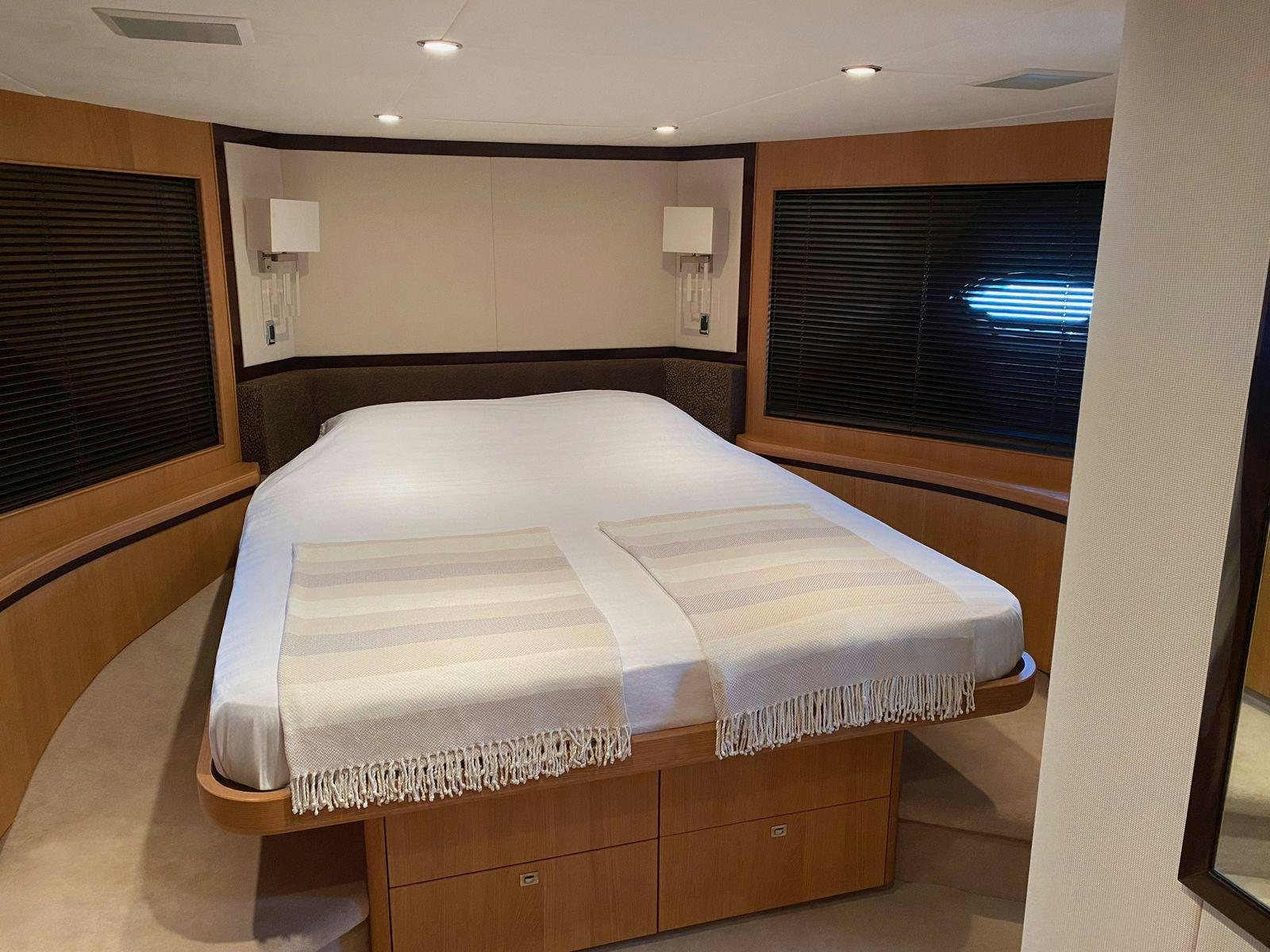 a bed in a room aboard VIXEN Yacht for Sale