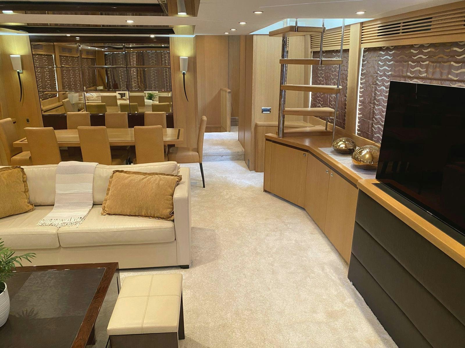 a living room with a large window aboard VIXEN Yacht for Sale