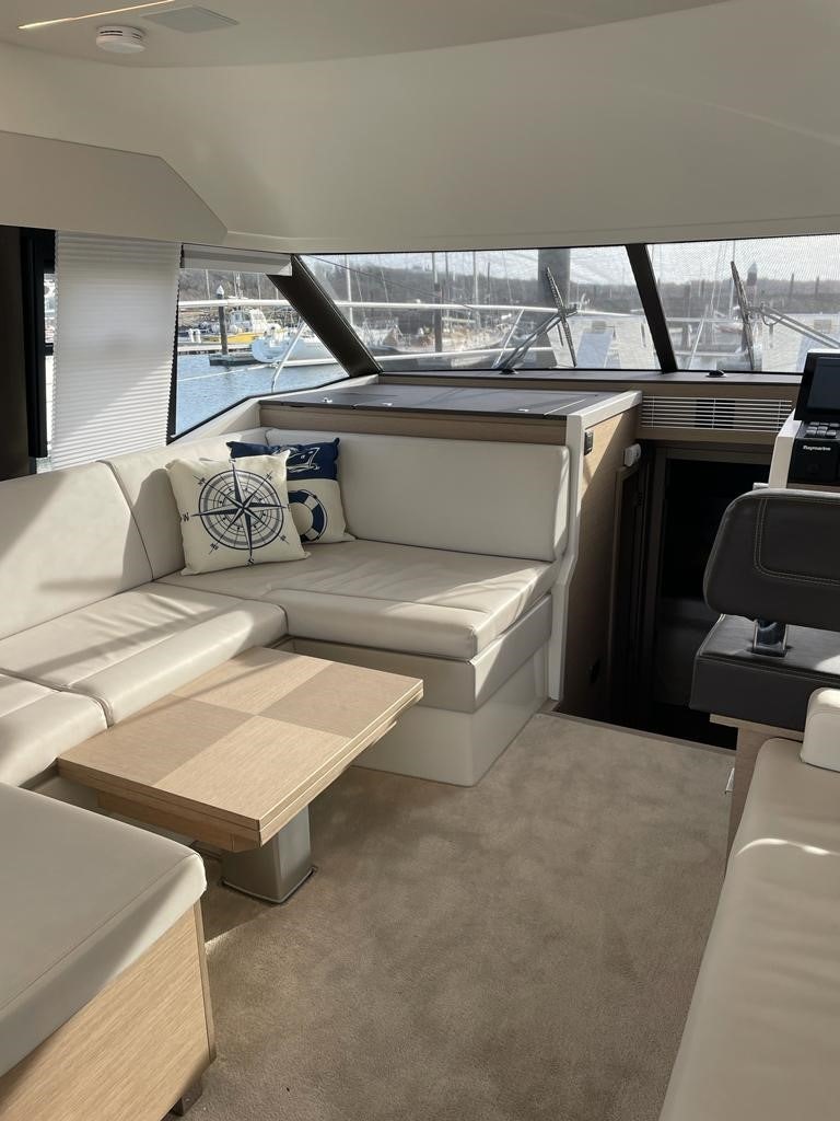 a couch in a room aboard SEAS THE DAY Yacht for Sale