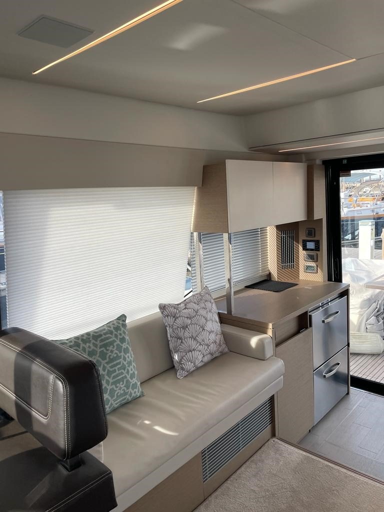 a couch and a chair in a room aboard SEAS THE DAY Yacht for Sale