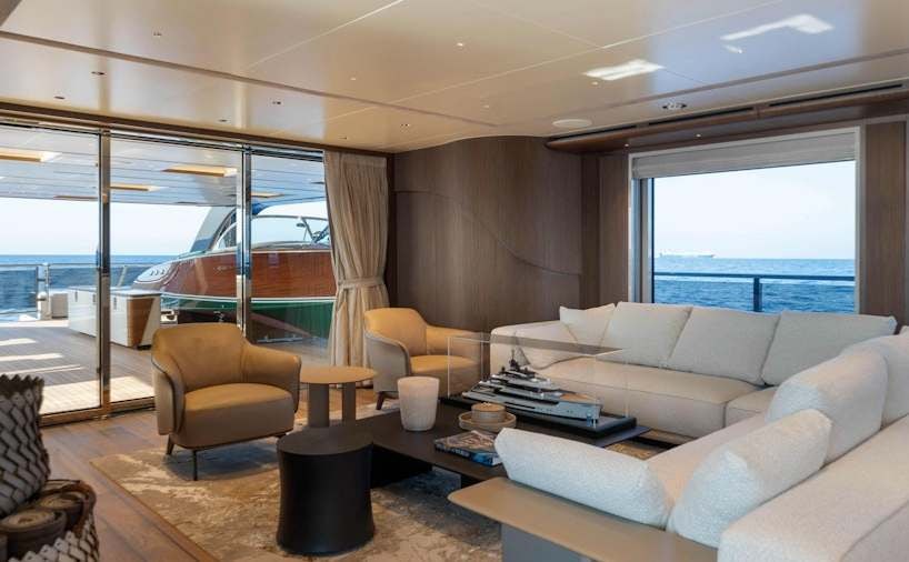 a living room with a large window aboard SERENISSIMA I Yacht for Charter