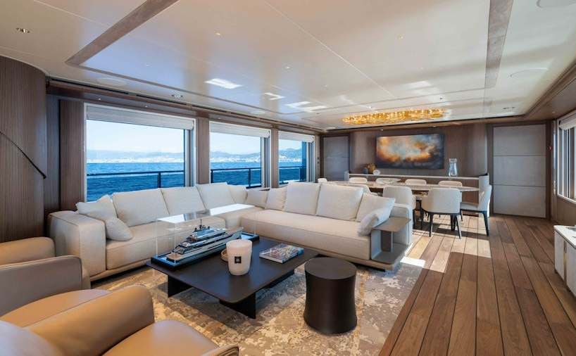a living room with a large window aboard SERENISSIMA I Yacht for Charter