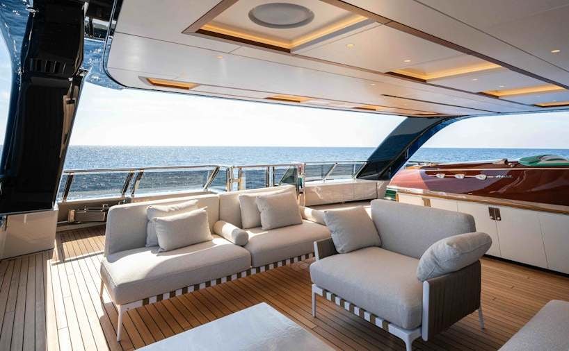 a living room with a large swimming pool aboard SERENISSIMA I Yacht for Charter
