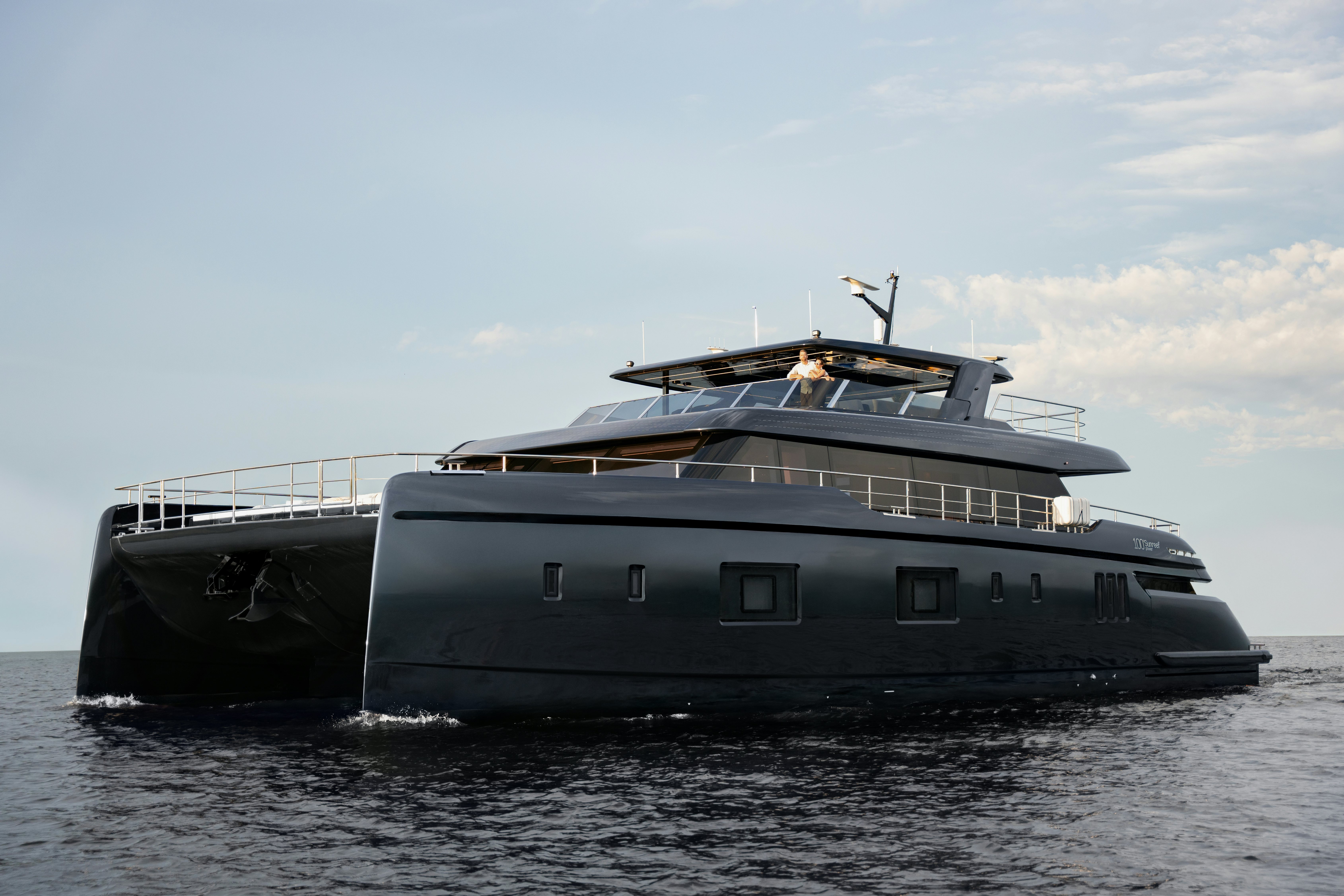 a large boat in the water aboard PETITE BELLE Yacht for Sale