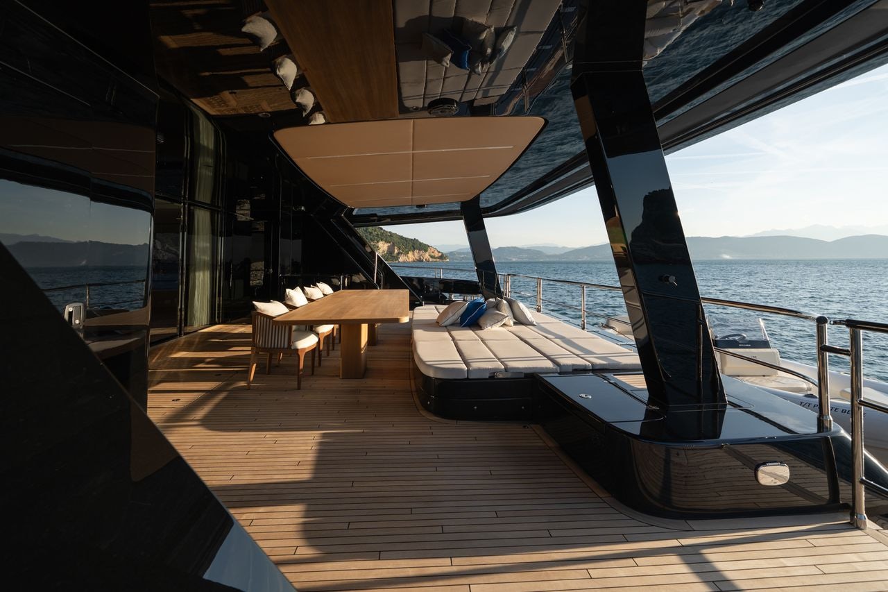 a boat on a deck aboard PETITE BELLE Yacht for Sale