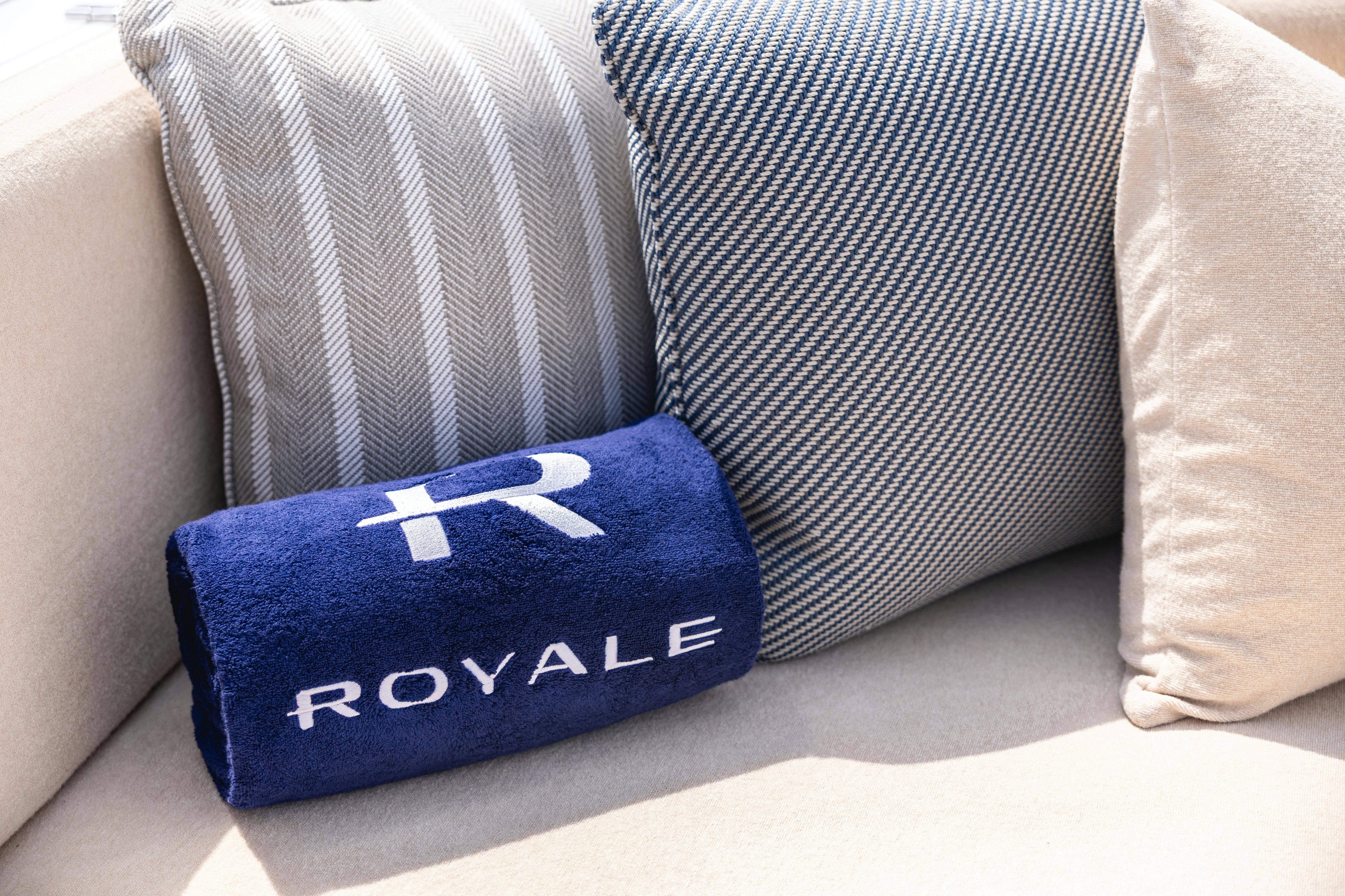 a blue and white striped pillow aboard ROYALE X Yacht for Charter