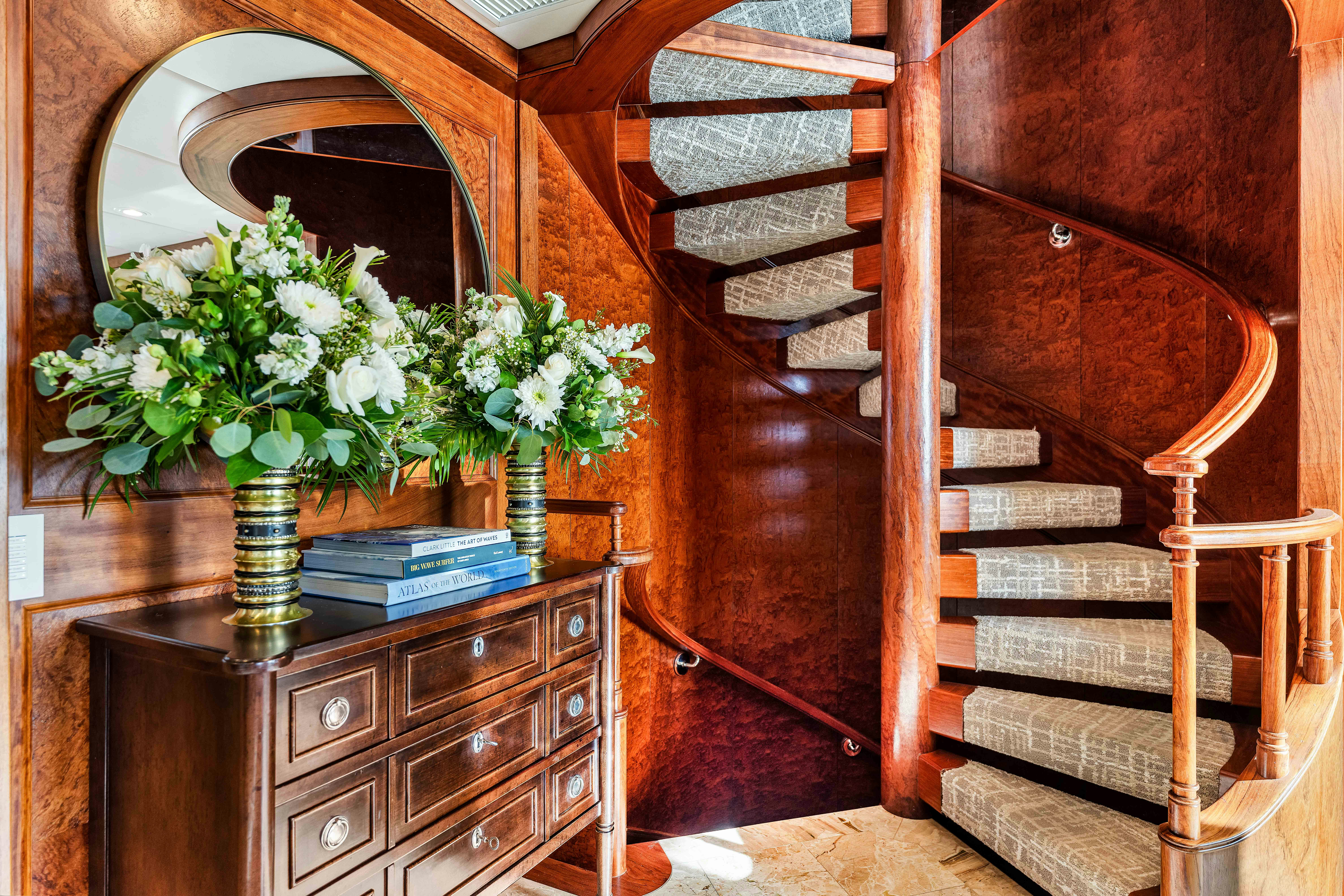 a vase of flowers on a dresser aboard STAR DIAMOND Yacht for Charter