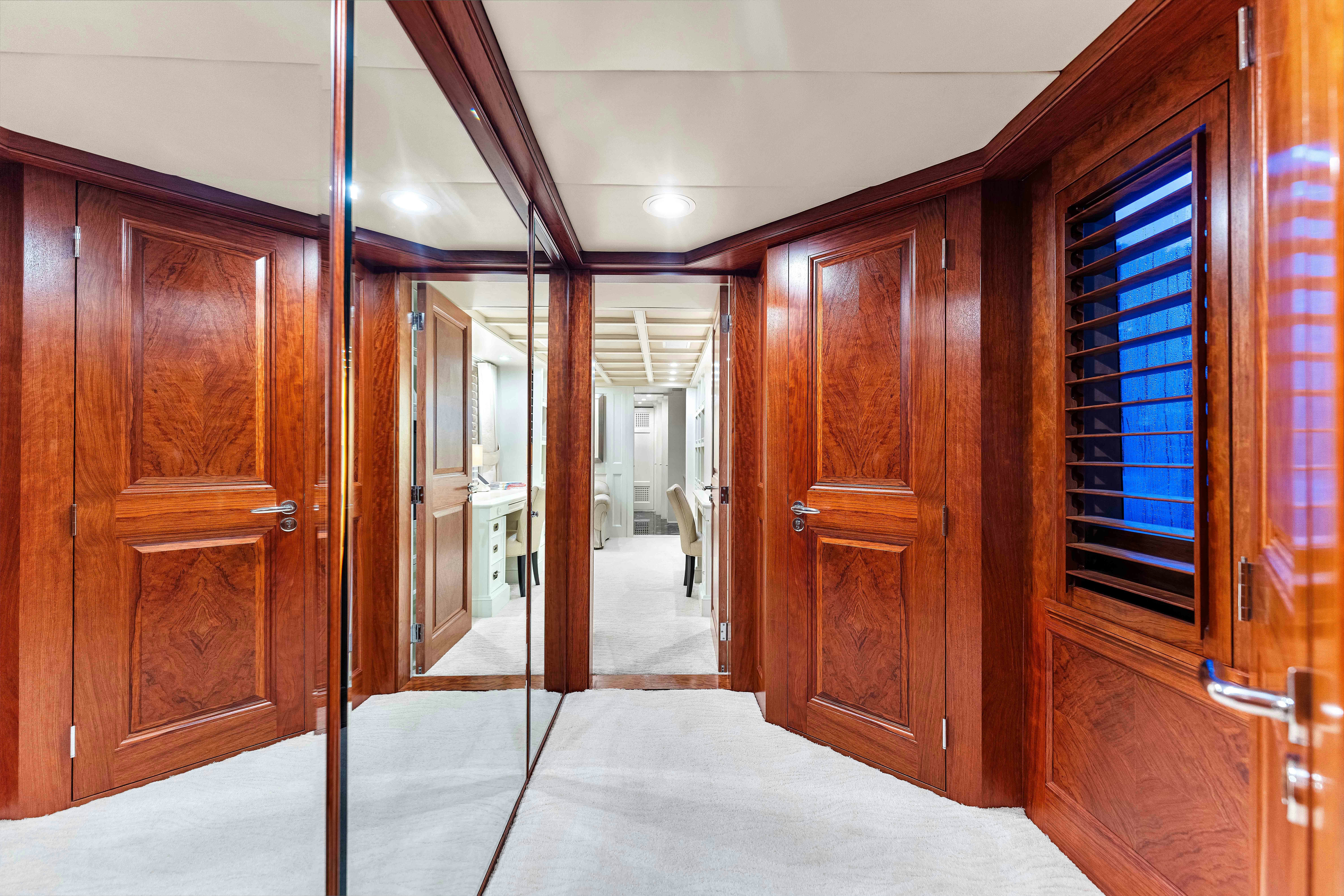 a room with wooden cabinets aboard STAR DIAMOND Yacht for Charter