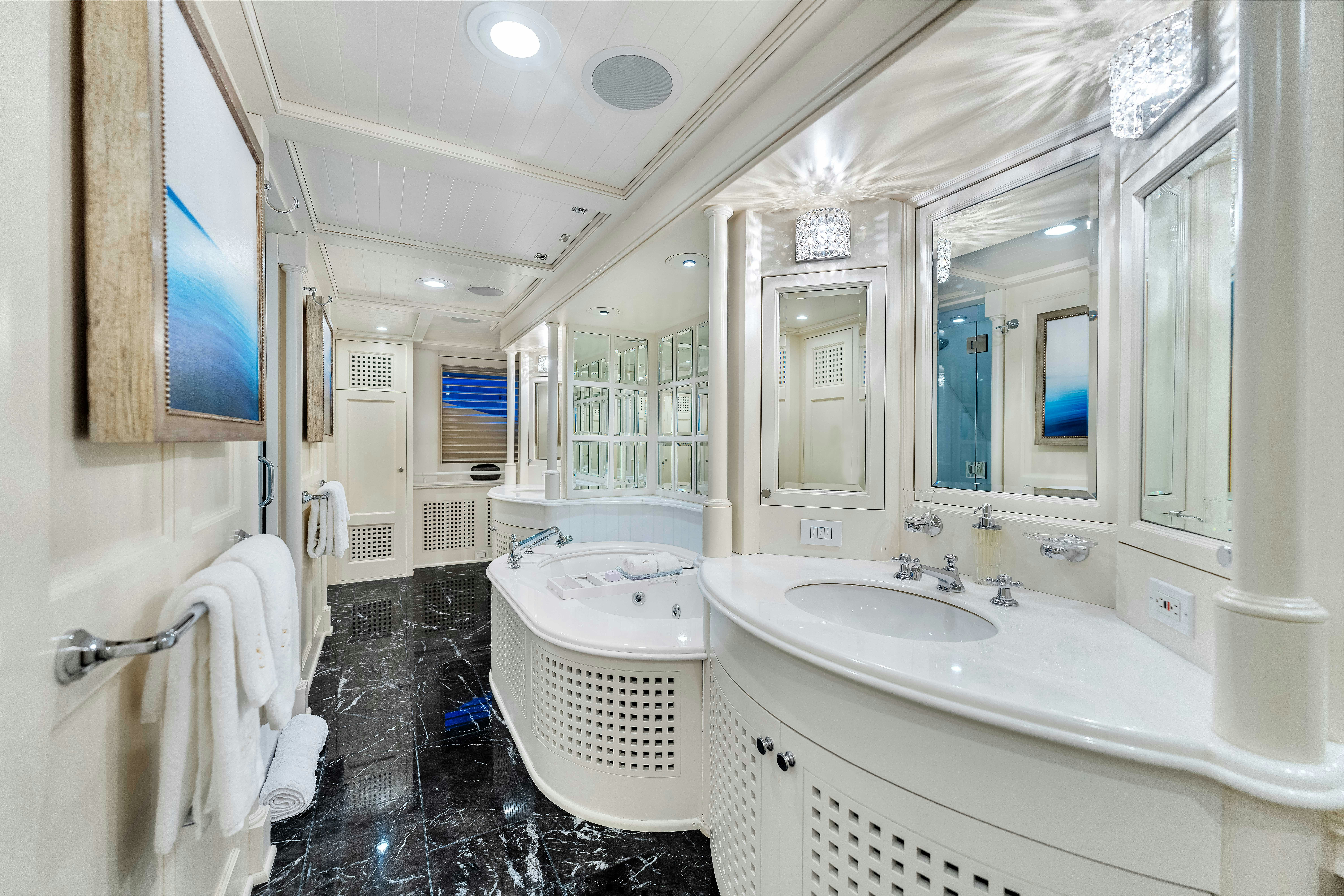 a bathroom with sinks and mirrors aboard STAR DIAMOND Yacht for Sale
