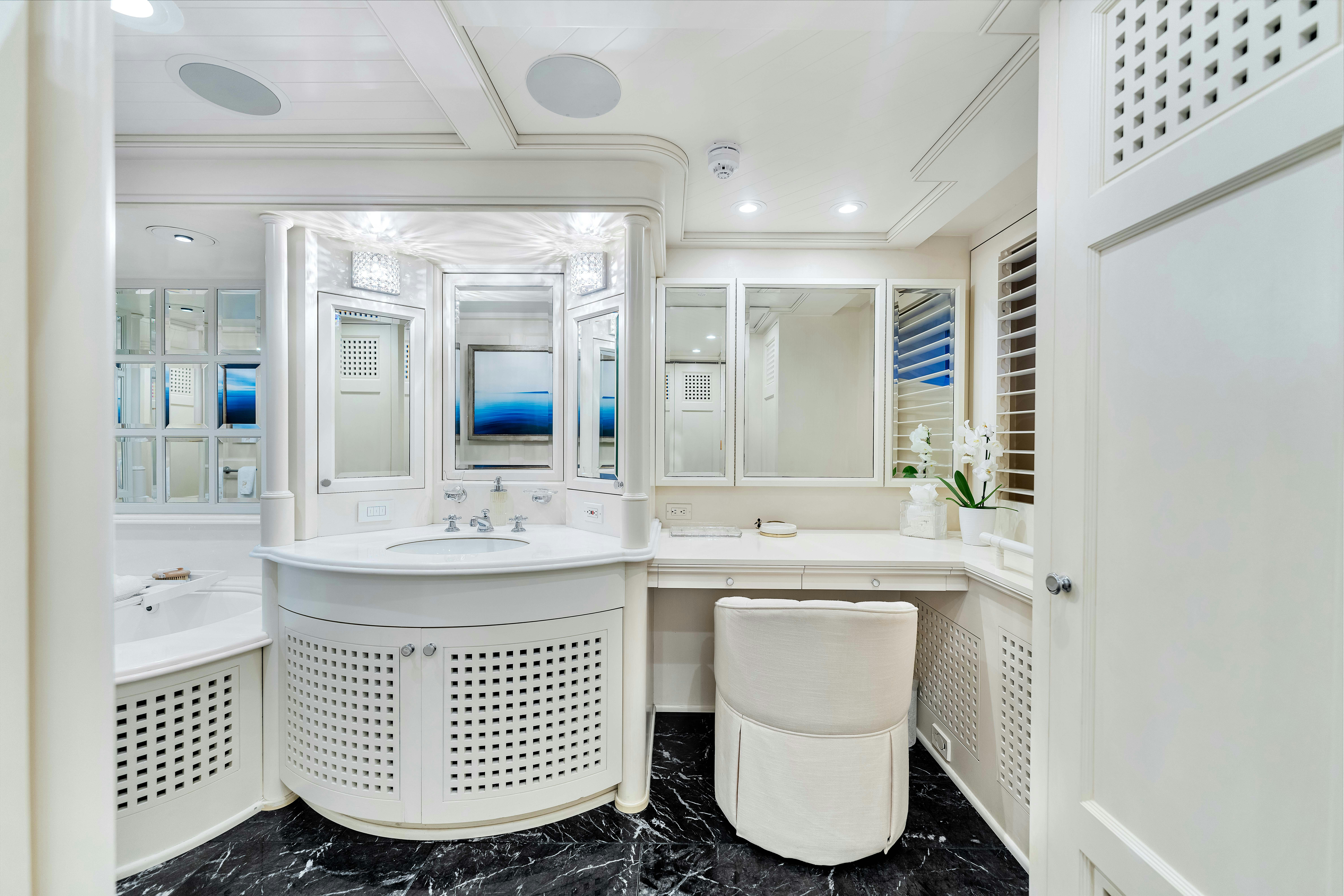 a bathroom with a toilet and sink aboard STAR DIAMOND Yacht for Sale