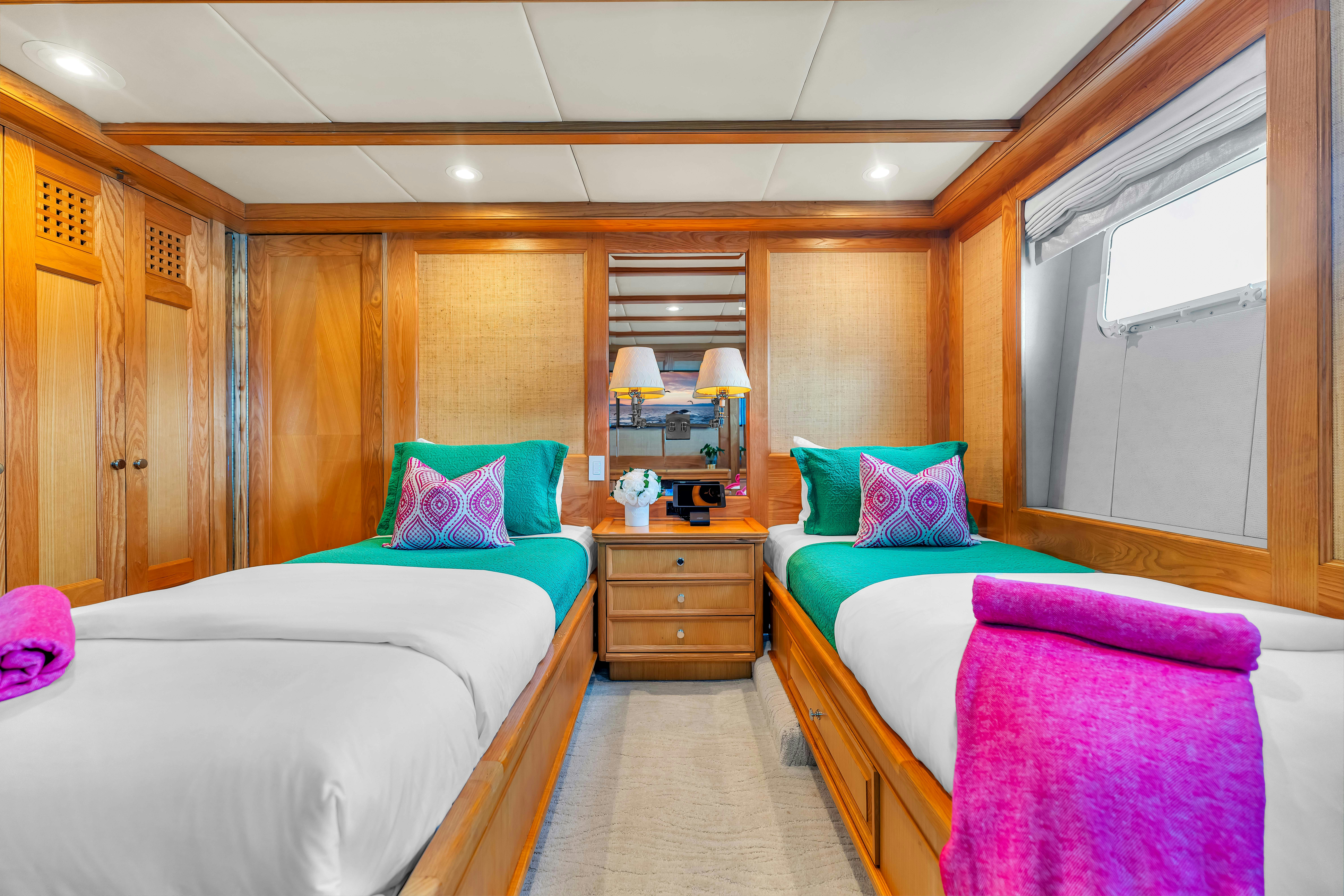 a couple of beds in a room aboard STAR DIAMOND Yacht for Charter