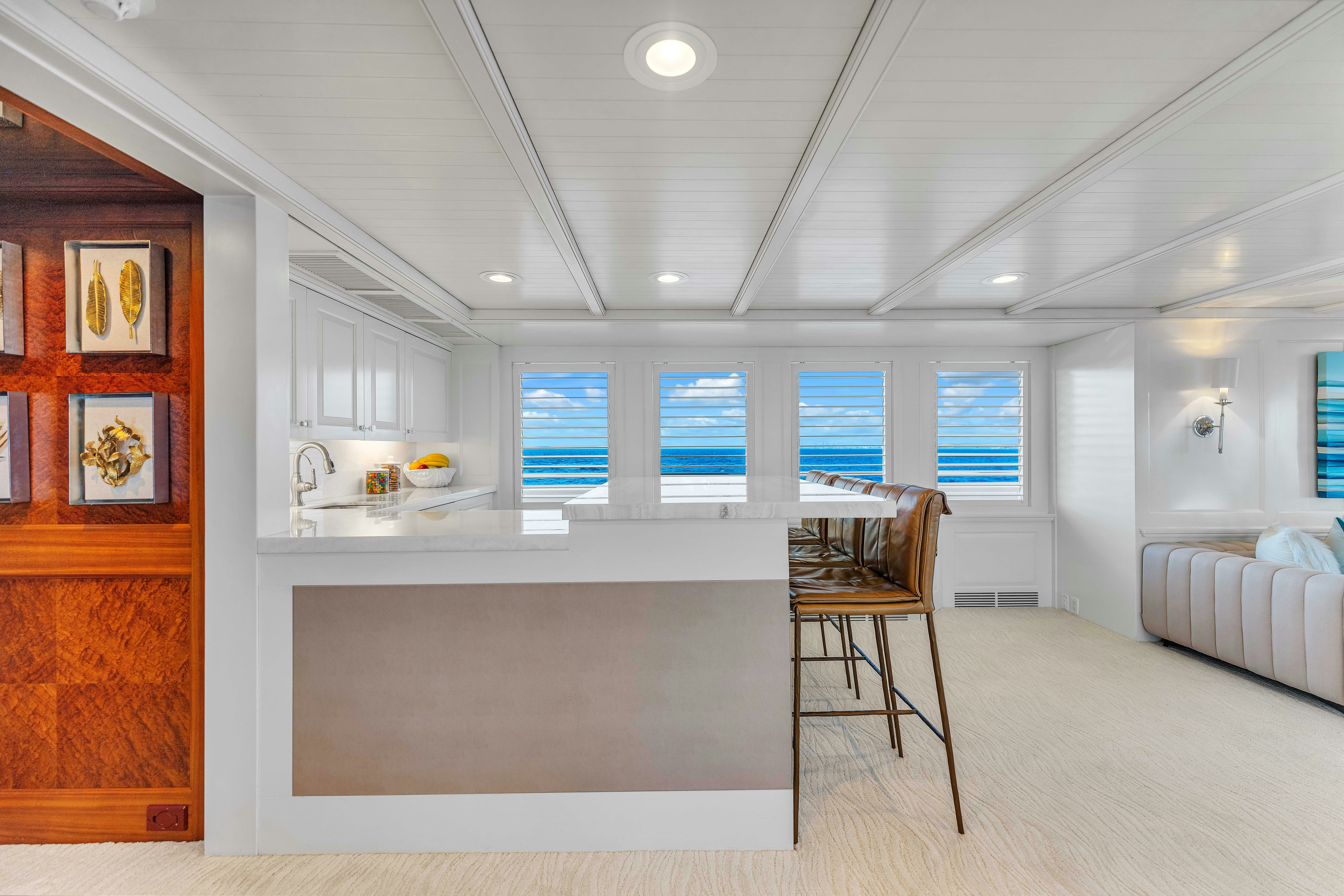 a room with a chair and a table aboard STAR DIAMOND Yacht for Charter