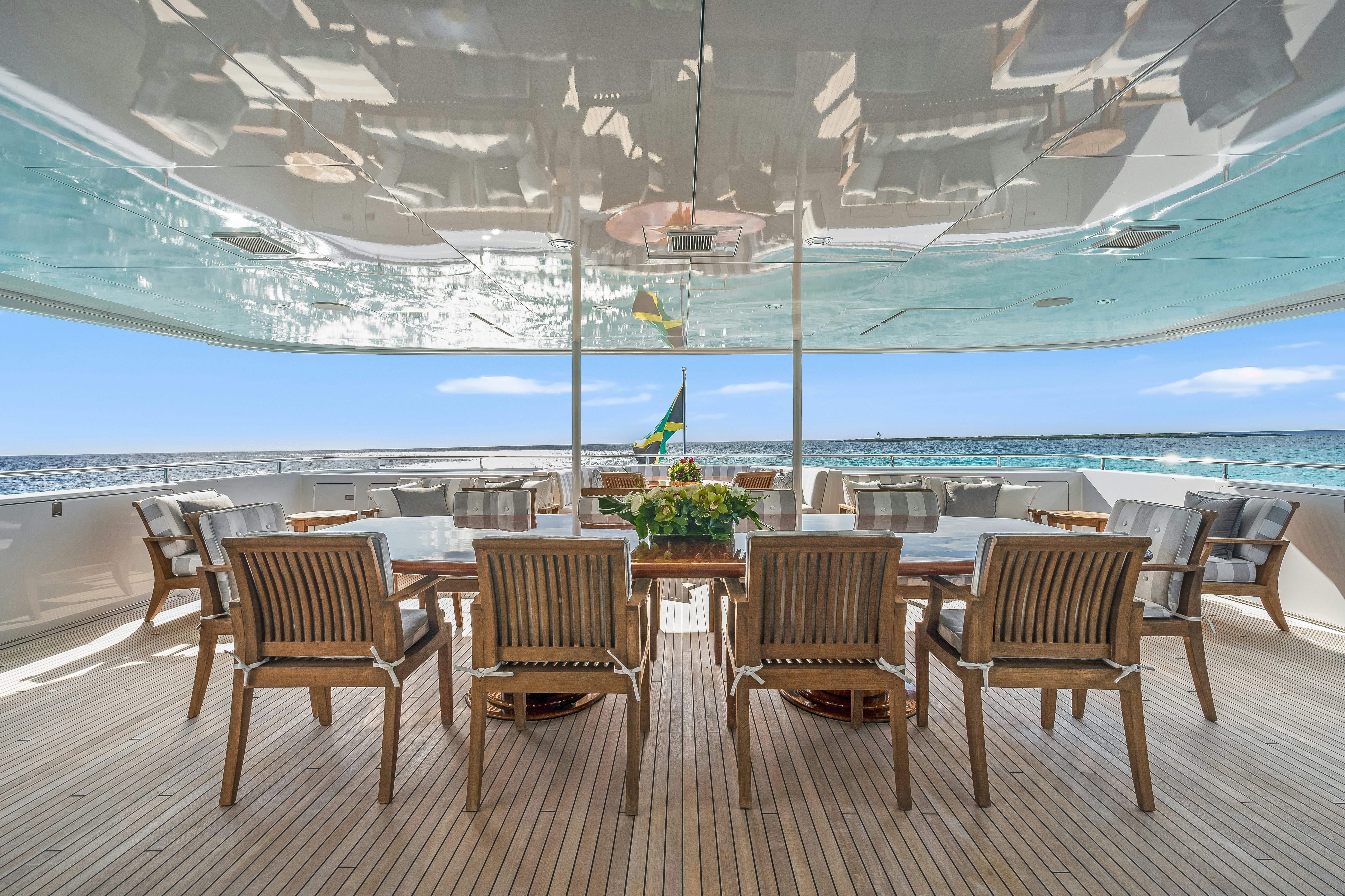 a room with chairs and tables aboard STAR DIAMOND Yacht for Charter
