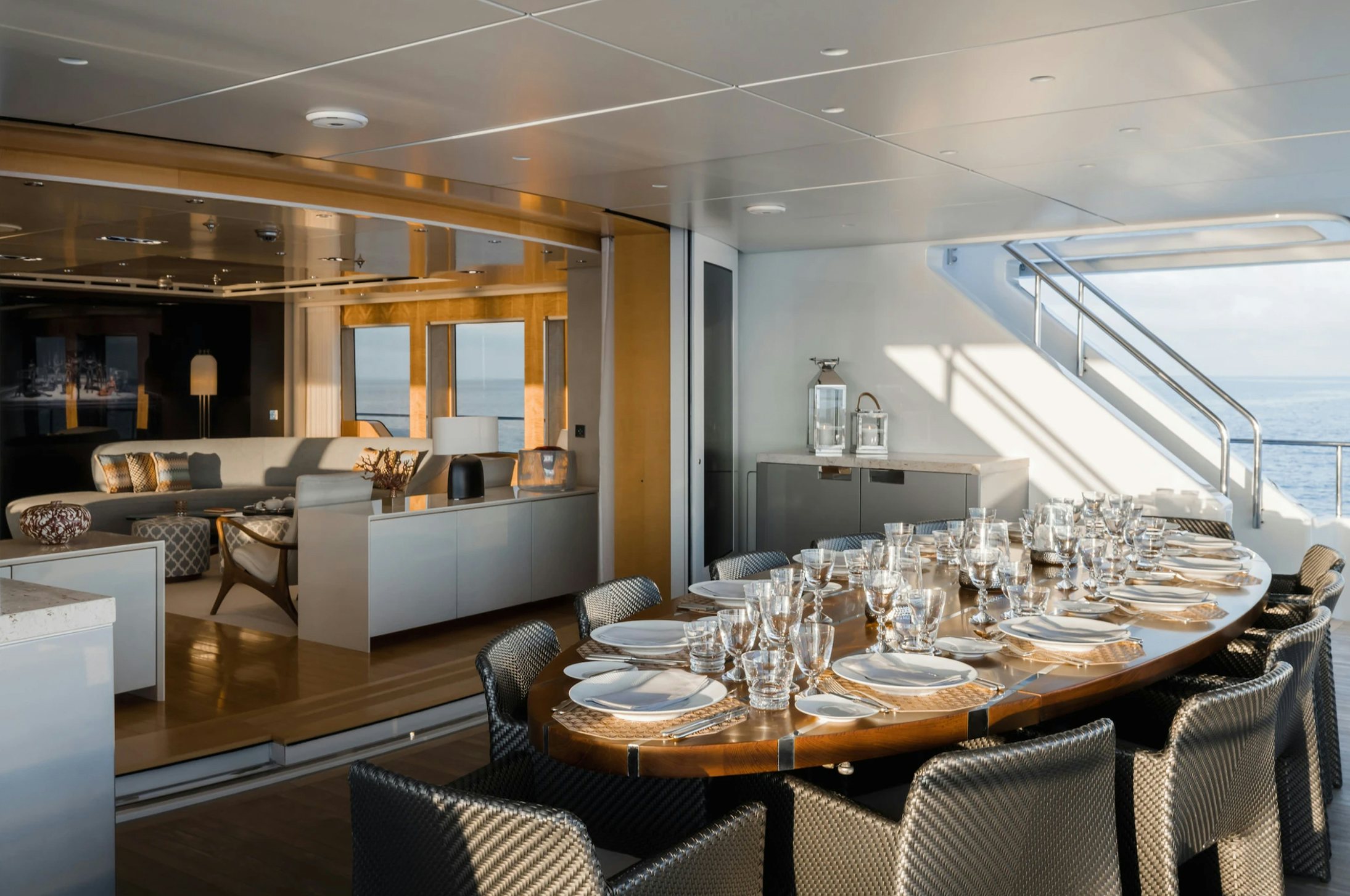 a dining room with a large table and chairs aboard LOON Yacht for Charter