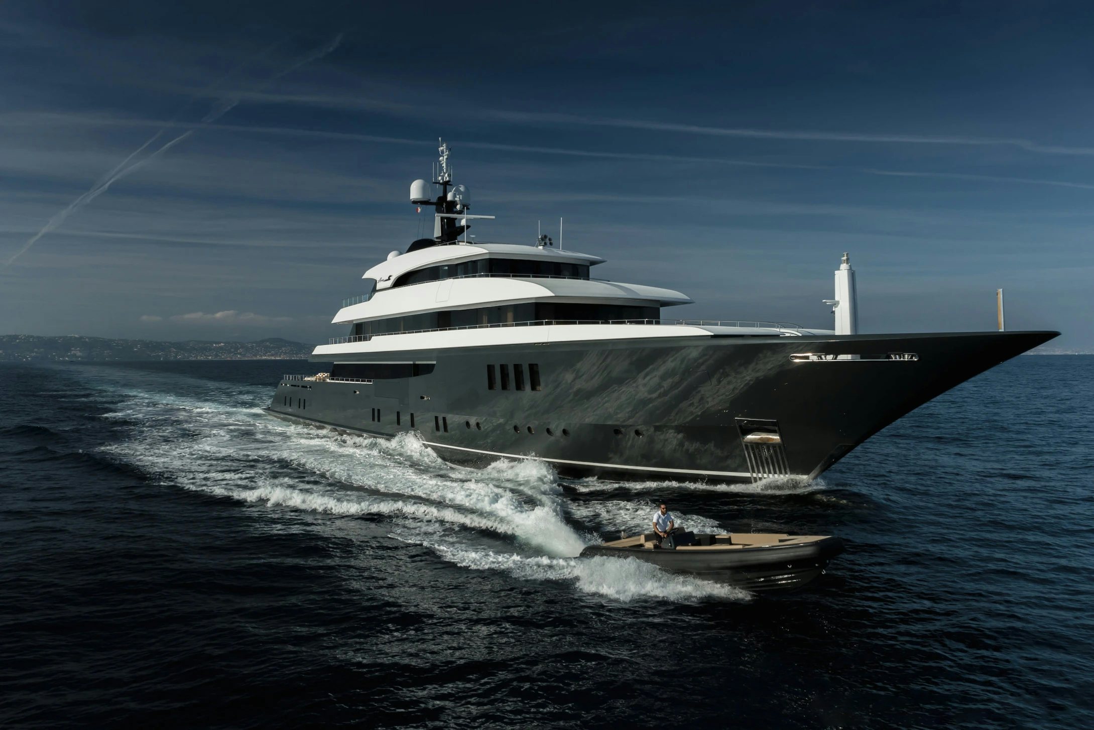 a large ship in the water aboard LOON Yacht for Charter
