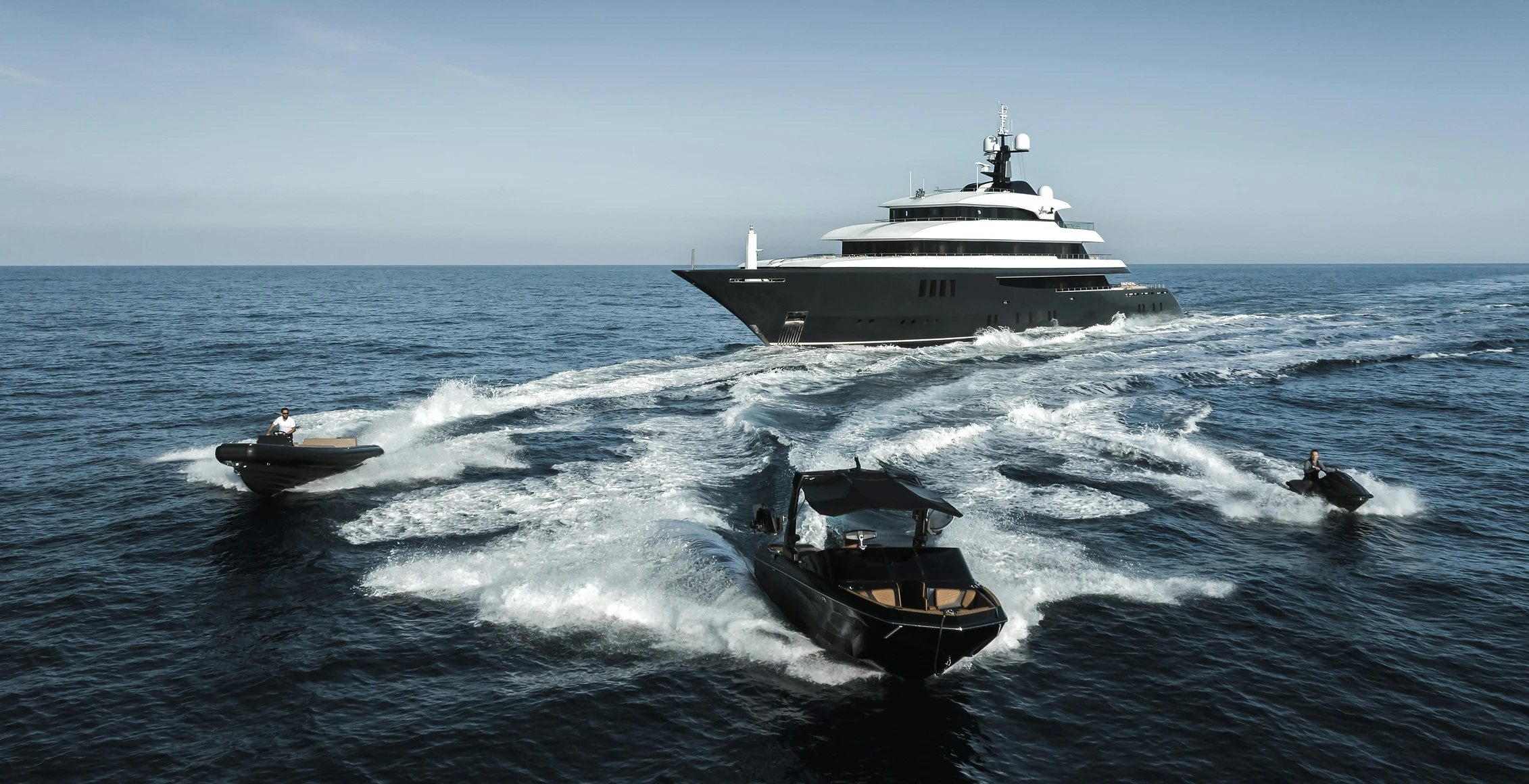 a boat and a boat in the water aboard LOON Yacht for Charter