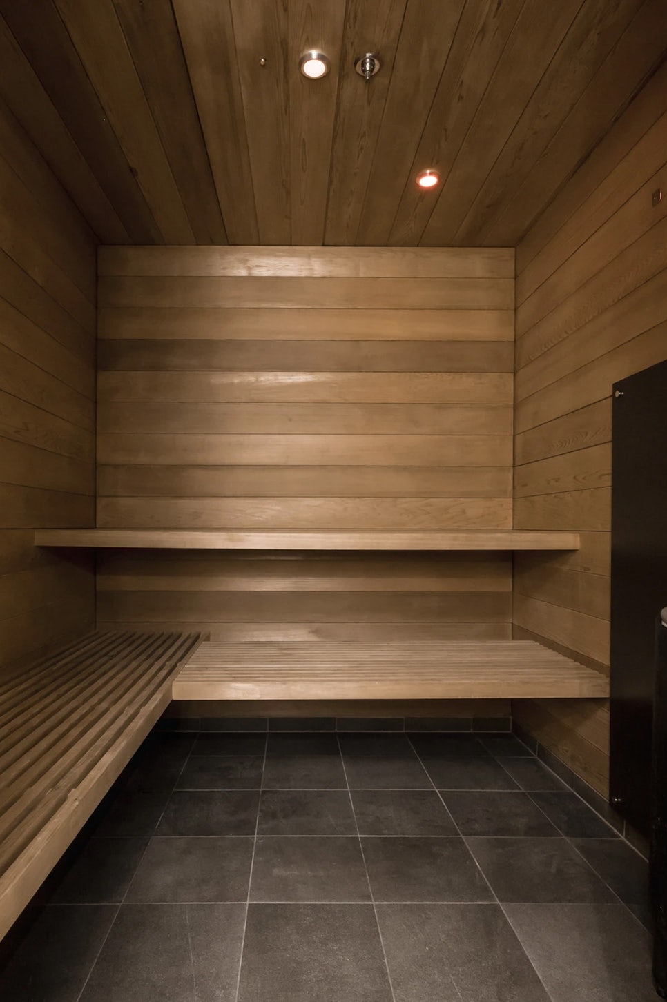 a wooden staircase in a building aboard LOON Yacht for Charter