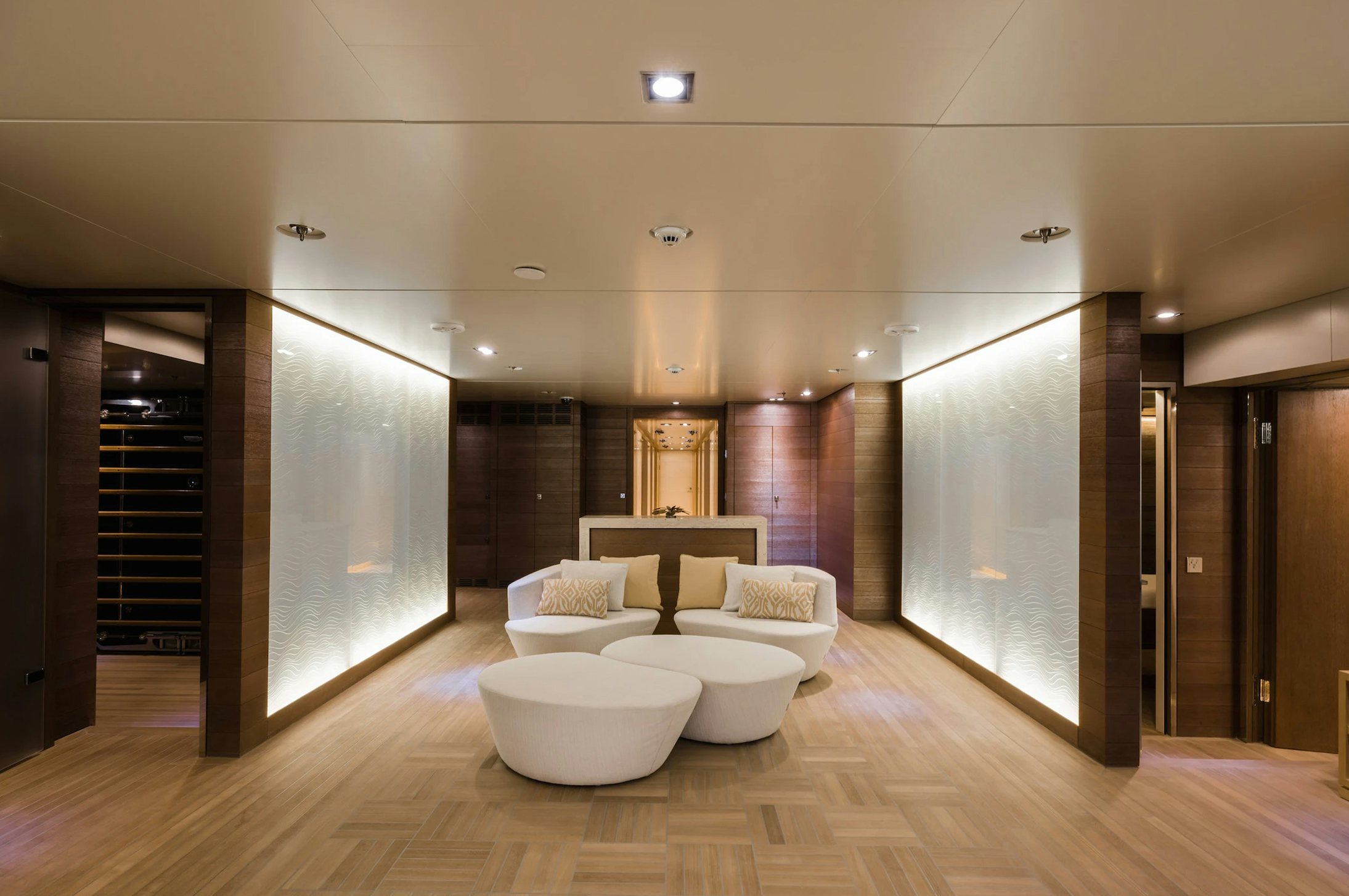 a room with a large mirror aboard LOON Yacht for Charter