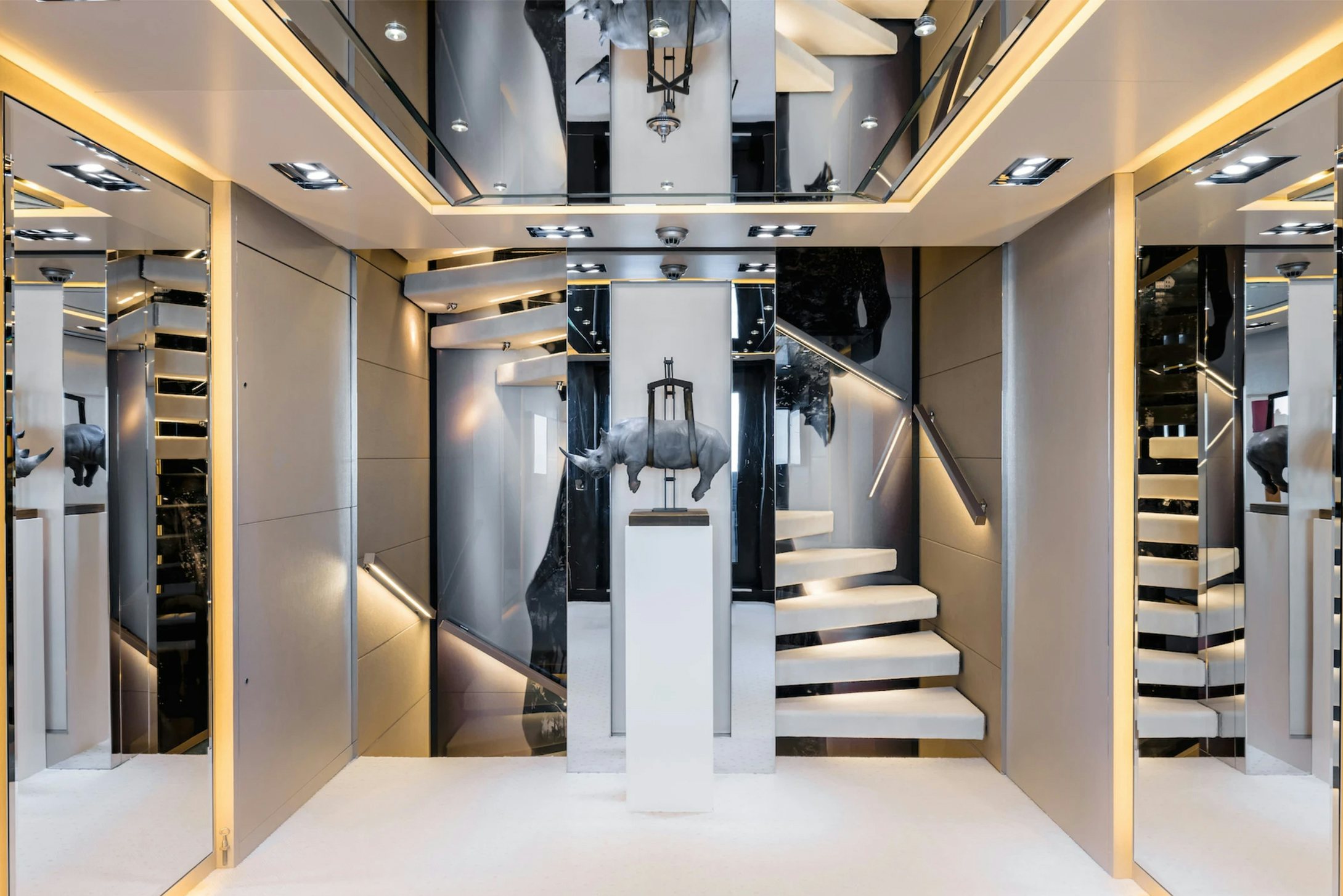 a large room with glass doors aboard LOON Yacht for Charter