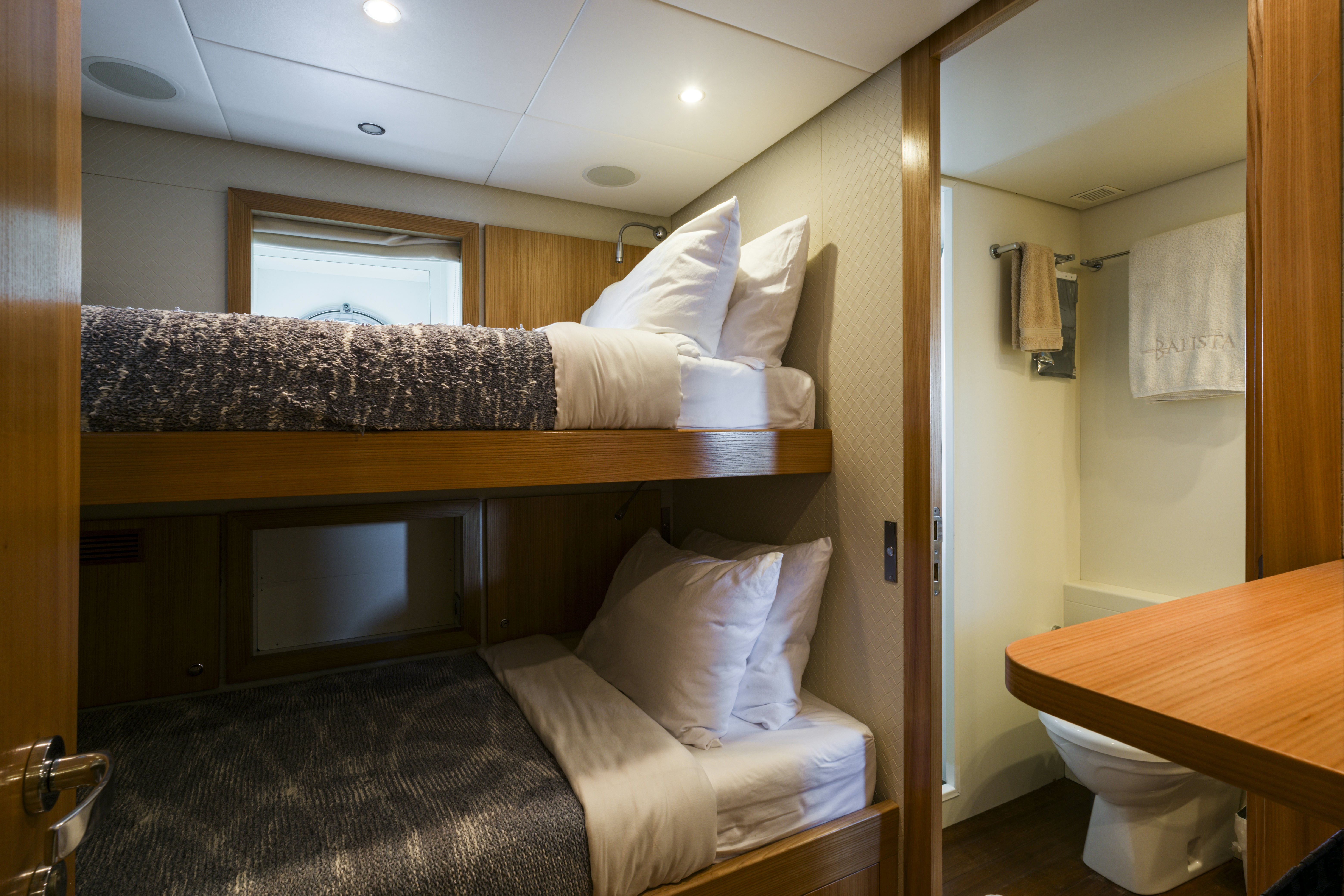 a hotel room with a bed aboard BALISTA Yacht for Sale