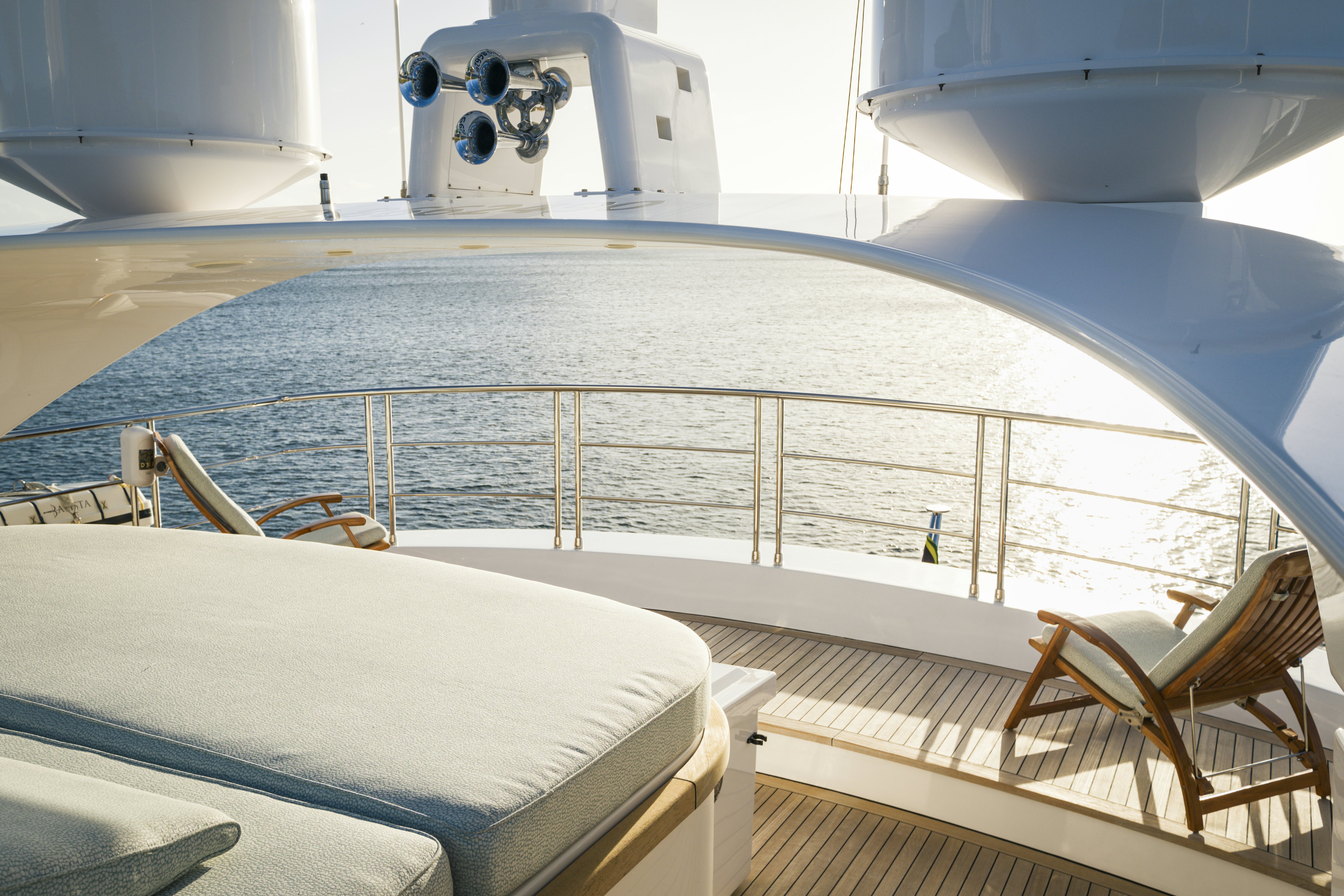 a large pool with a deck aboard BALISTA Yacht for Sale